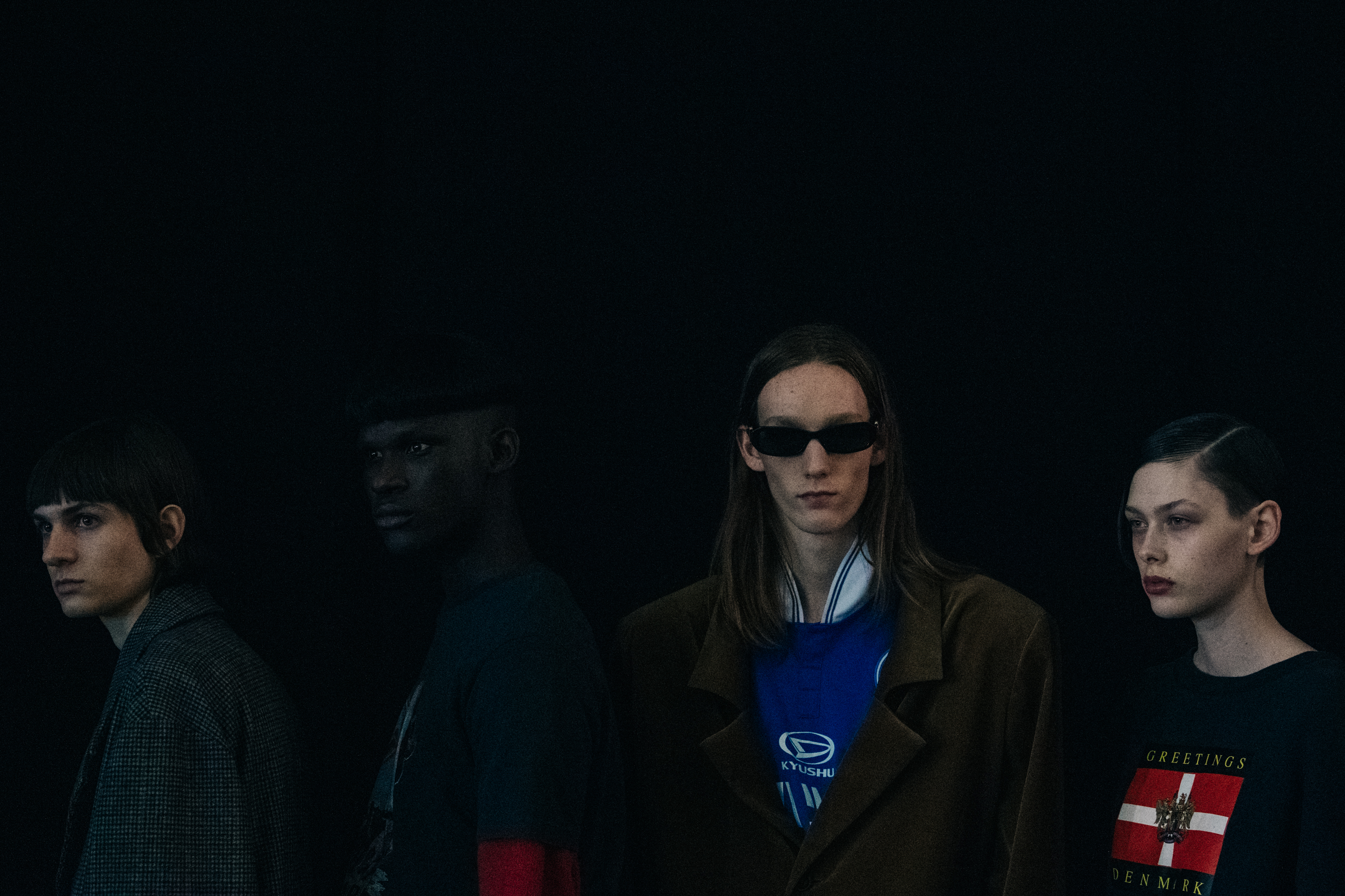 Model wearing red and blue backstage