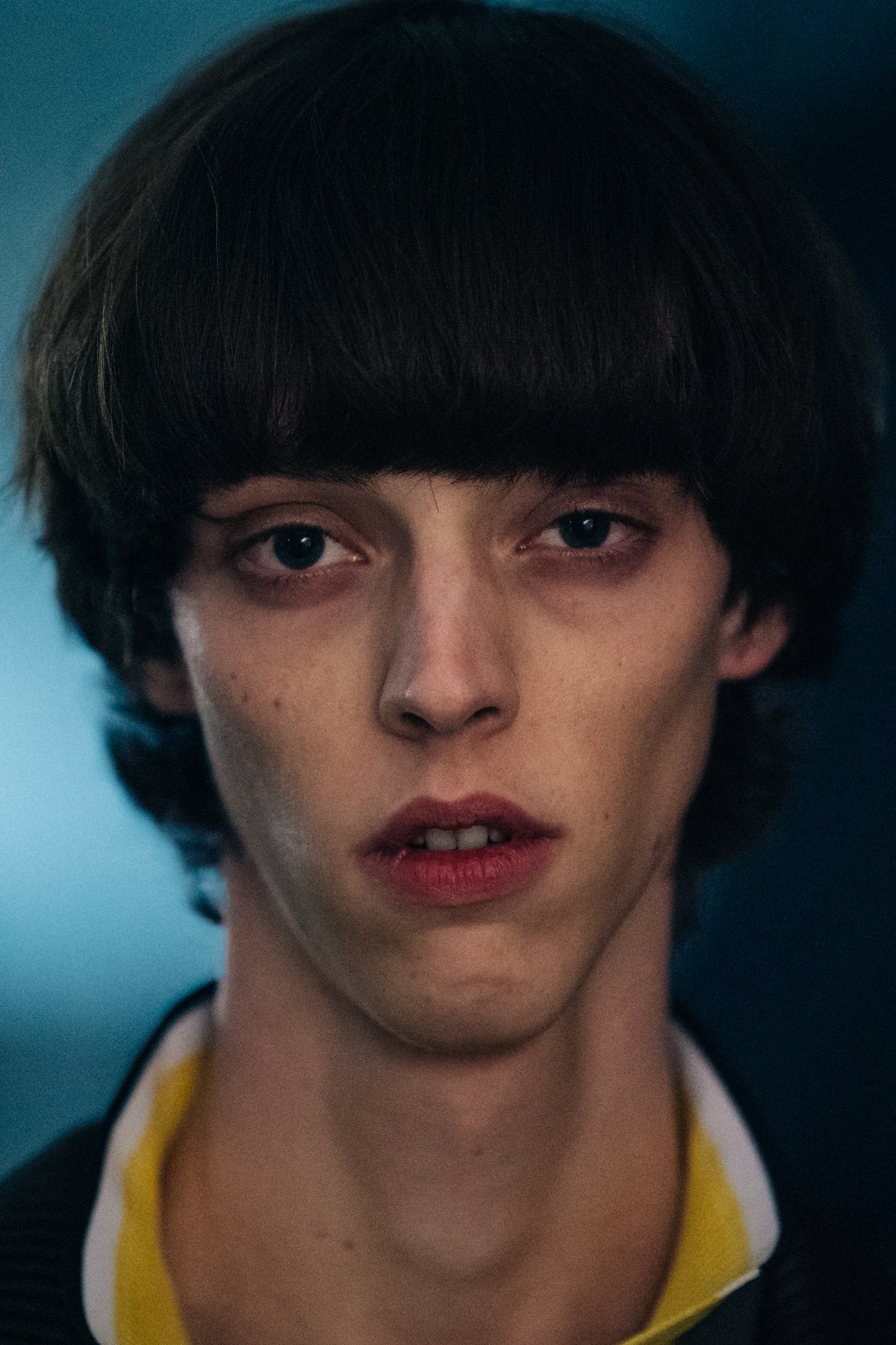 Portrait of model with thick black hair
