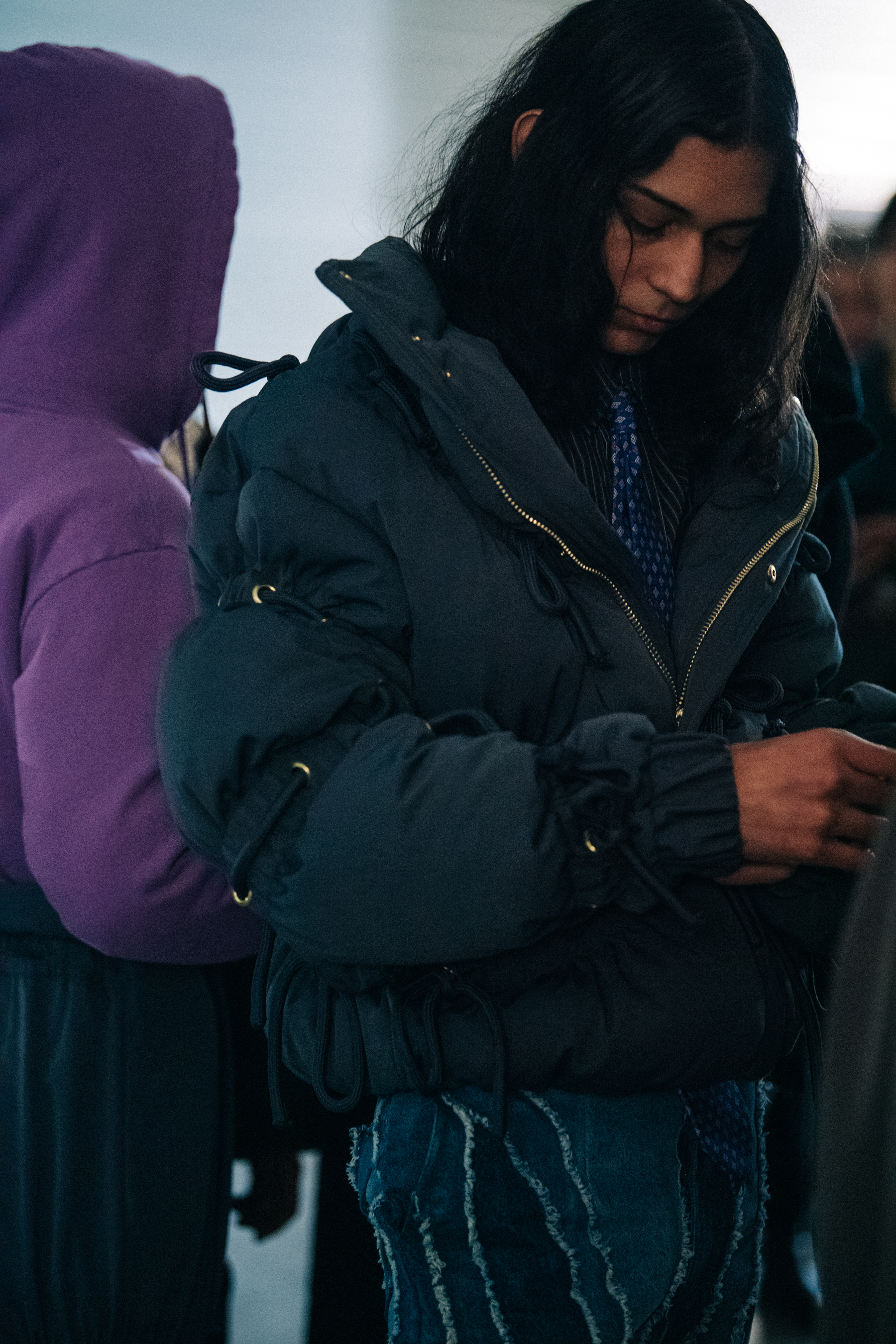 Model wearing coat at Han Kjøbenhavn