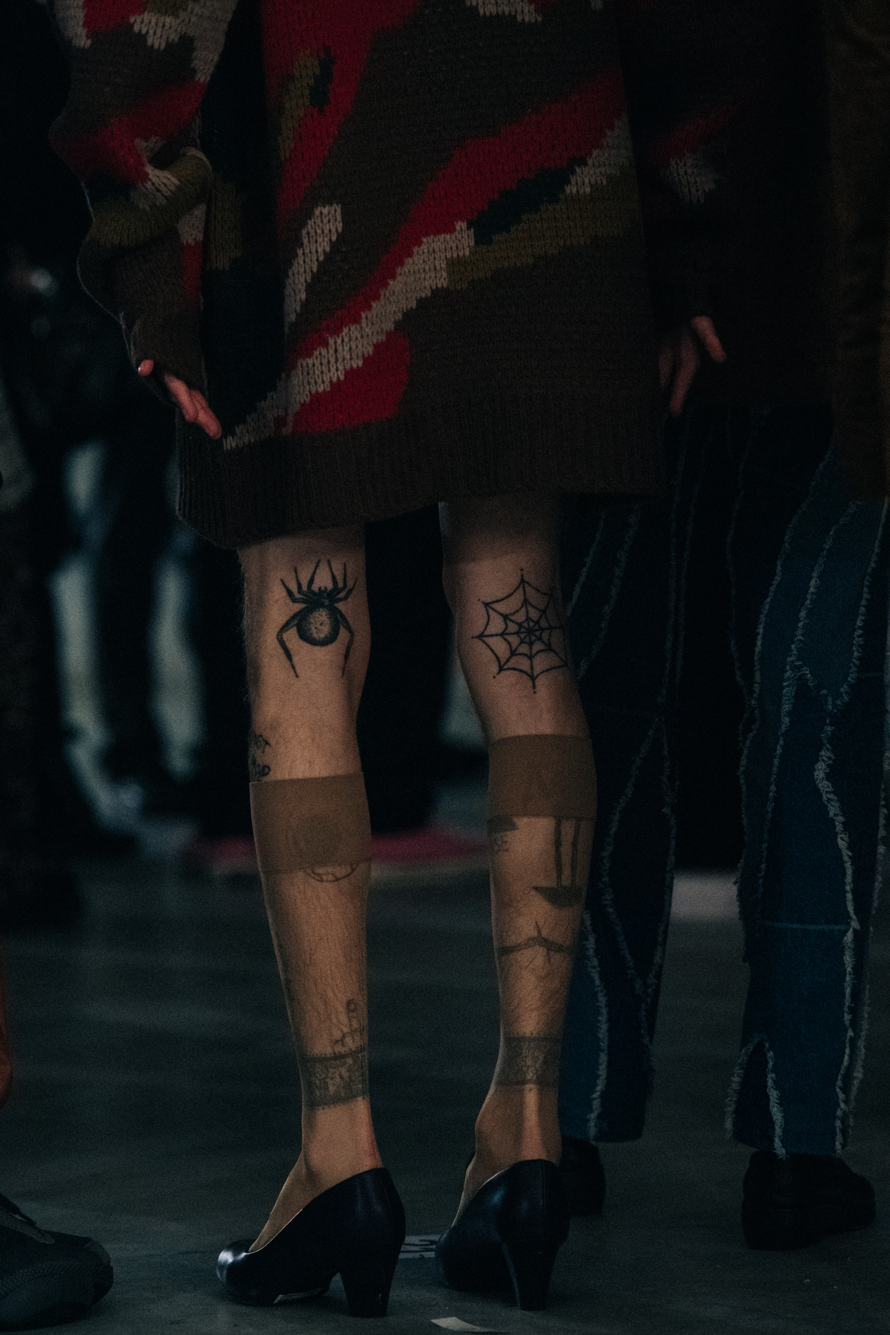 Model wearing short skirt at Han Kjøbenhavn