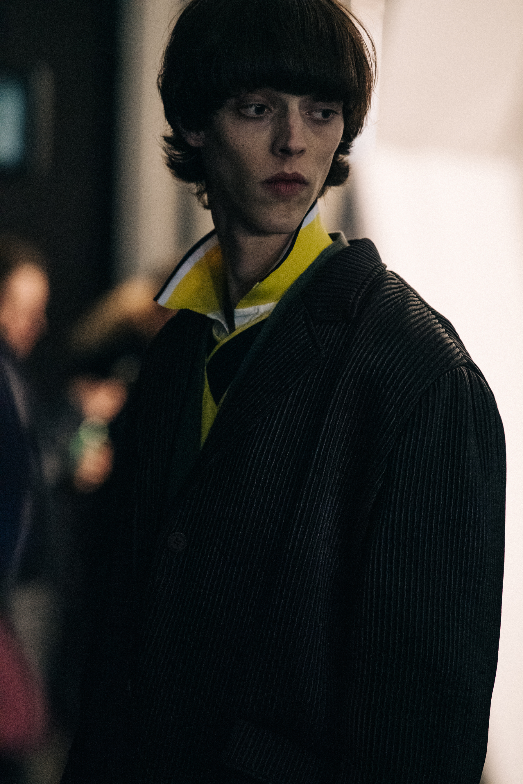 Model wearing yellow at Han Kjøbenhavn
