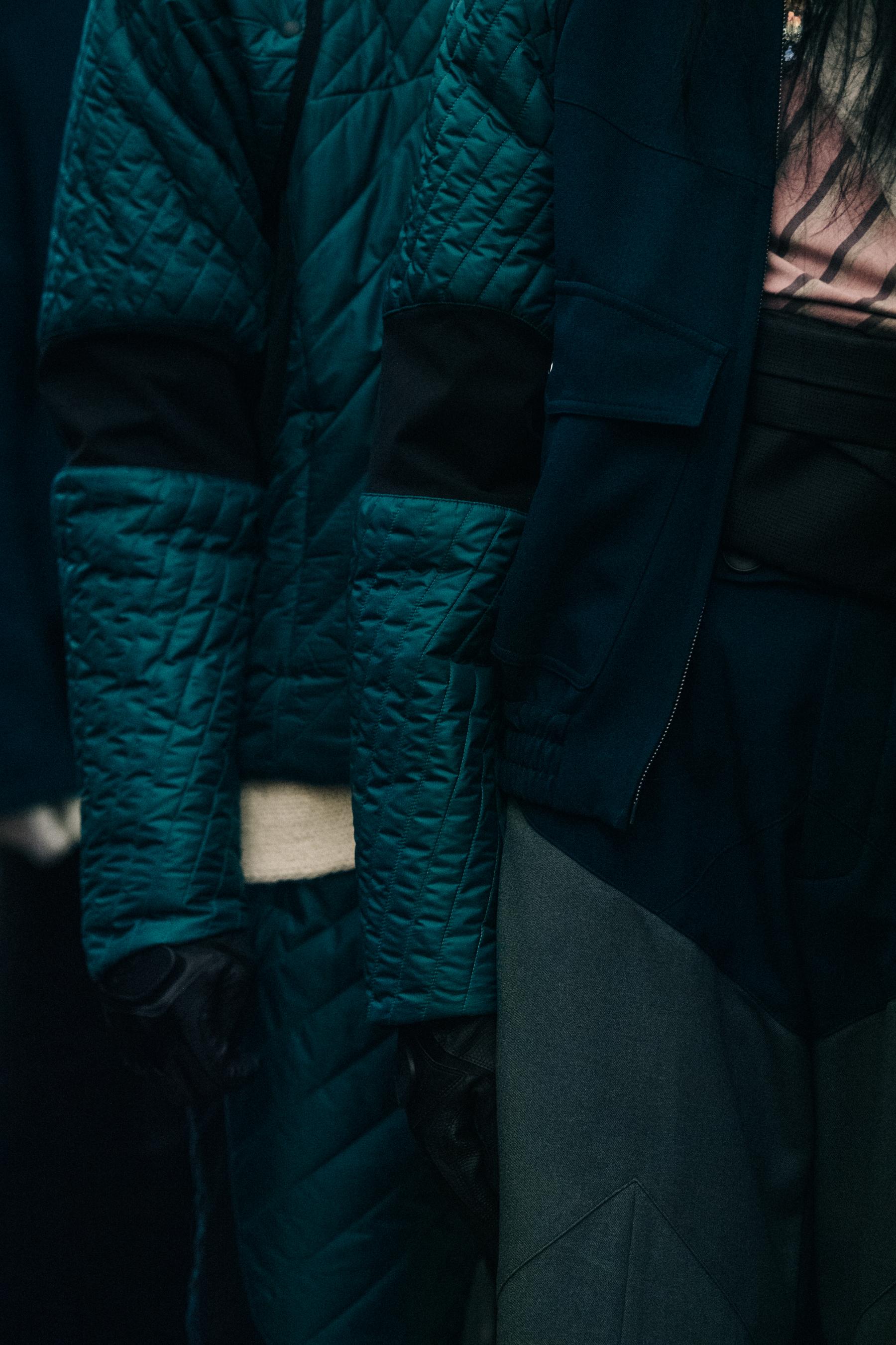 Models wearing blue tracksuits at Kiko Kostadinov