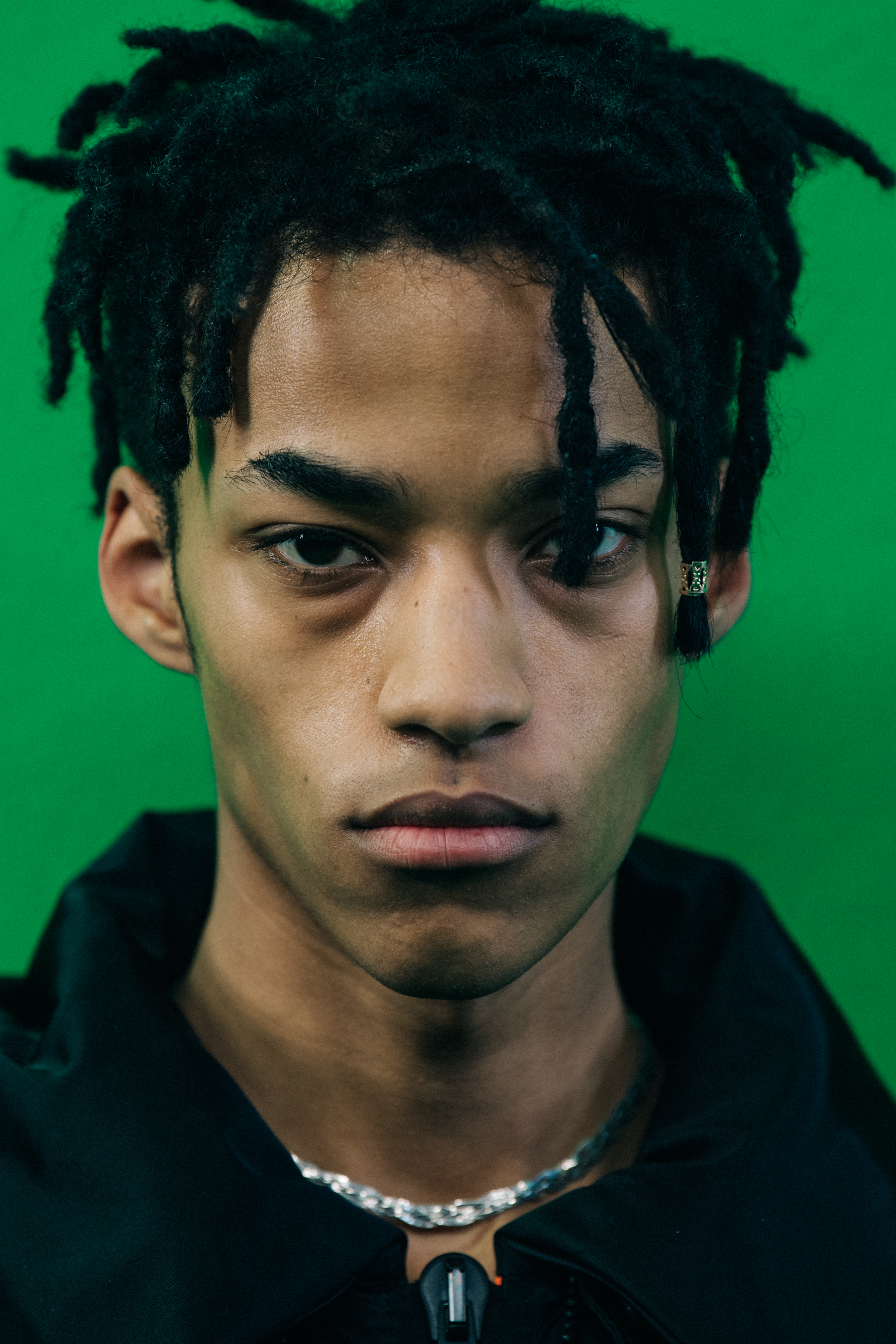 Model wearing black jacket at Off-White