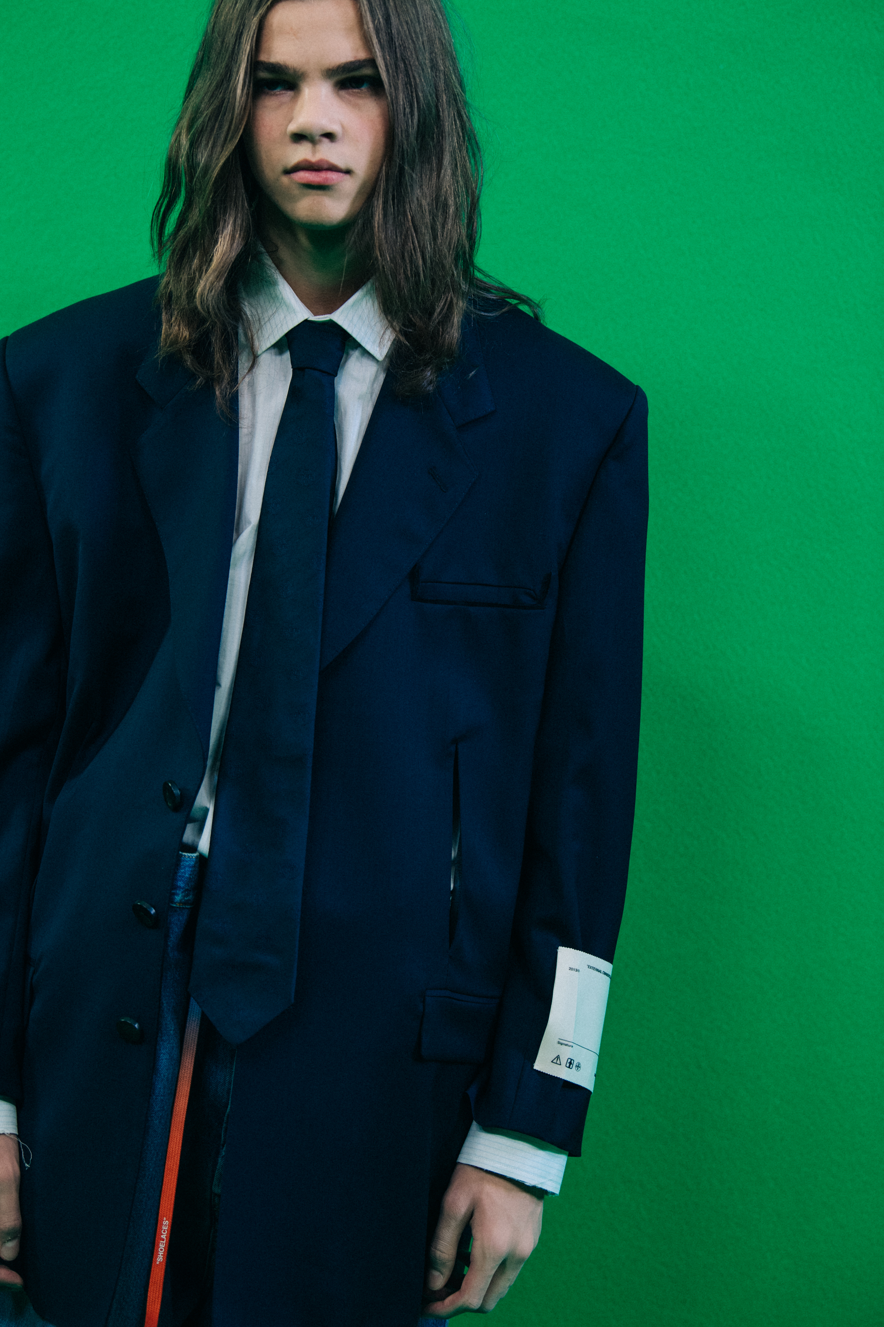 Model wearing suit at Off-White
