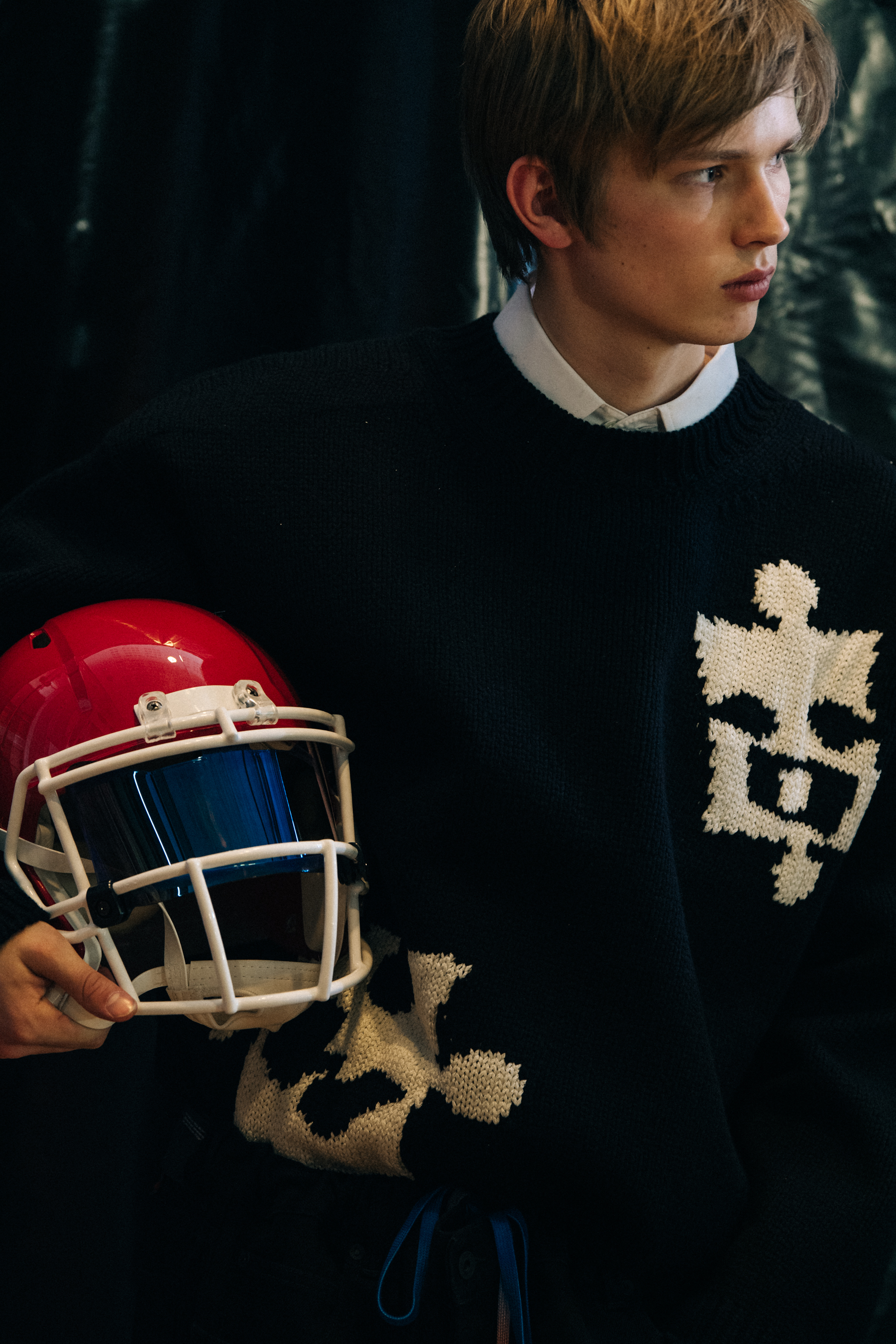 Model carrying helmet at Off-White