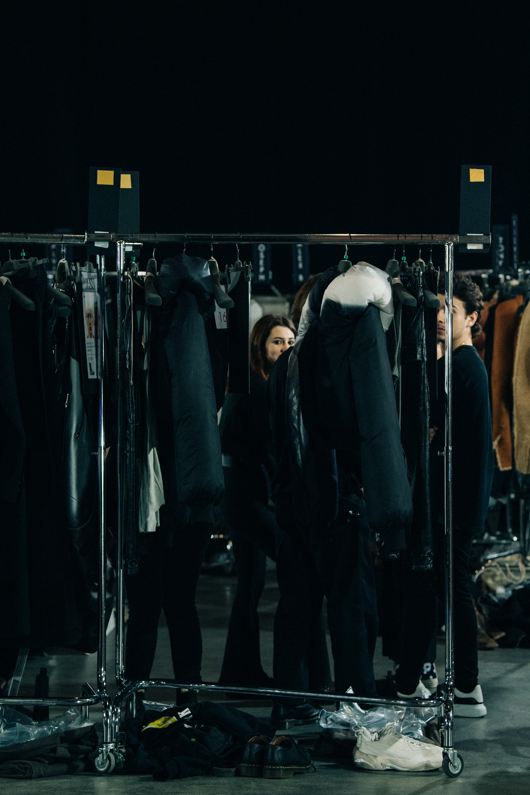 Clothes hanging backstage at Rick Owens
