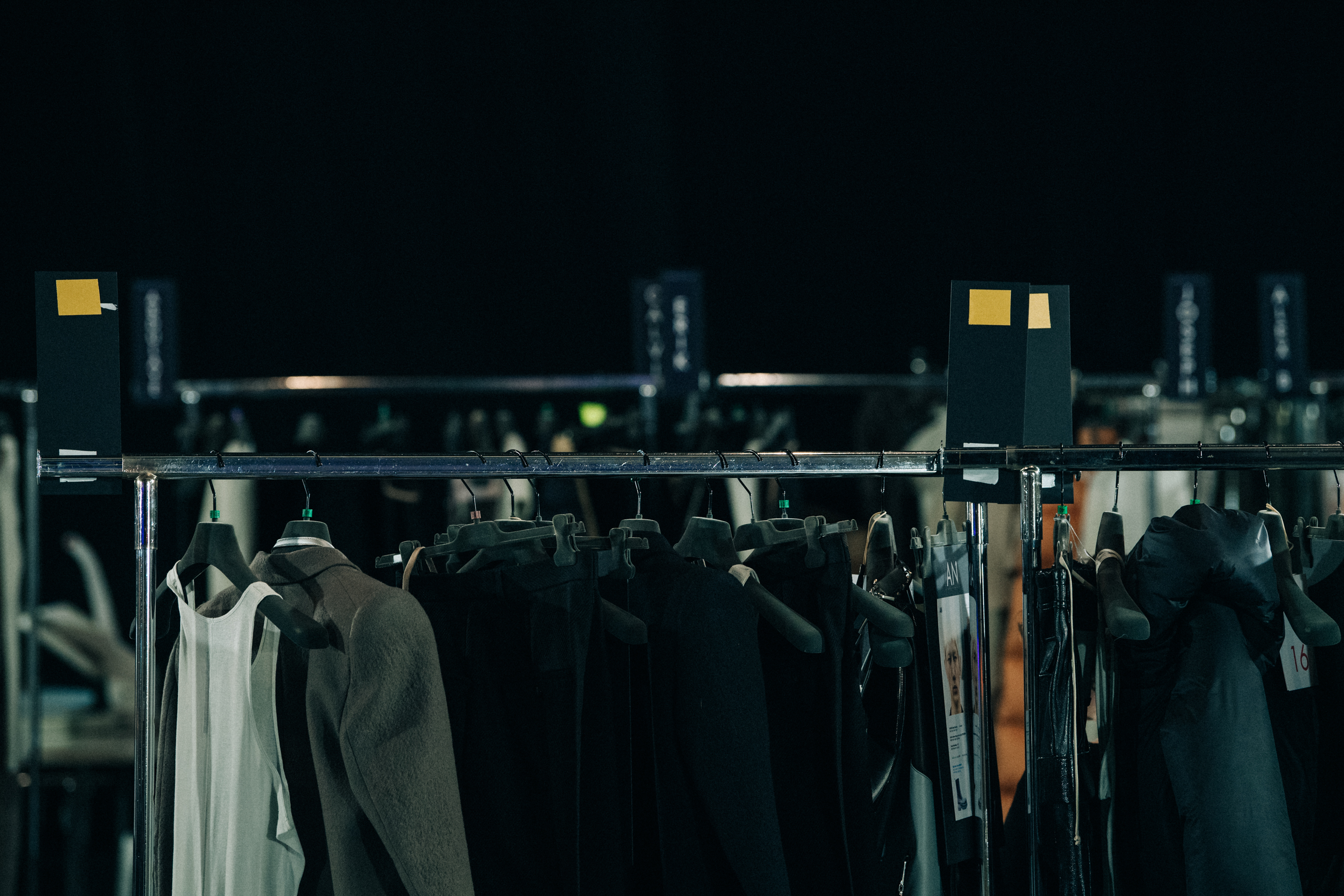 Clothes hanging backstage at Rick Owens
