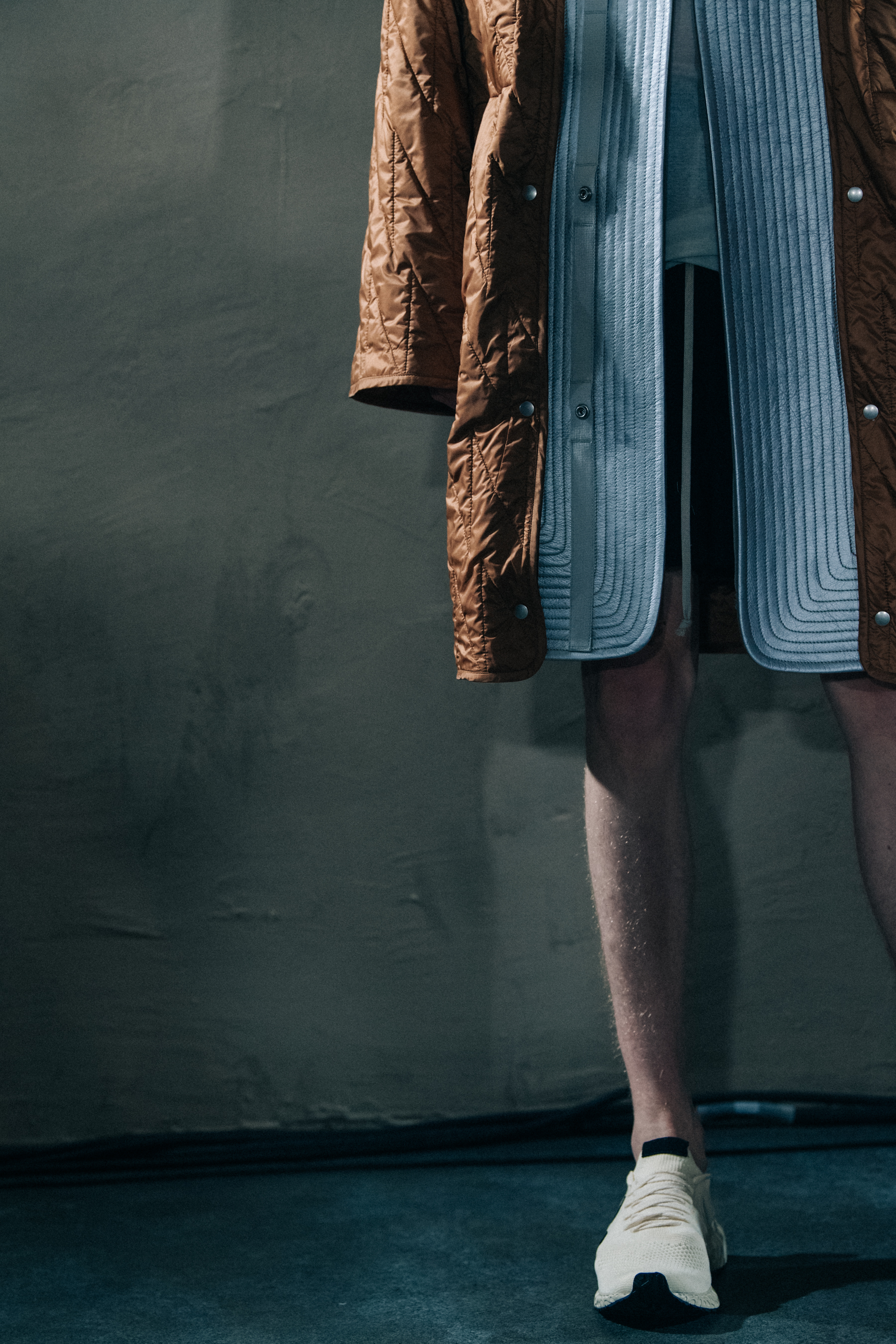 Model wearing tan outfit at Rick Owens