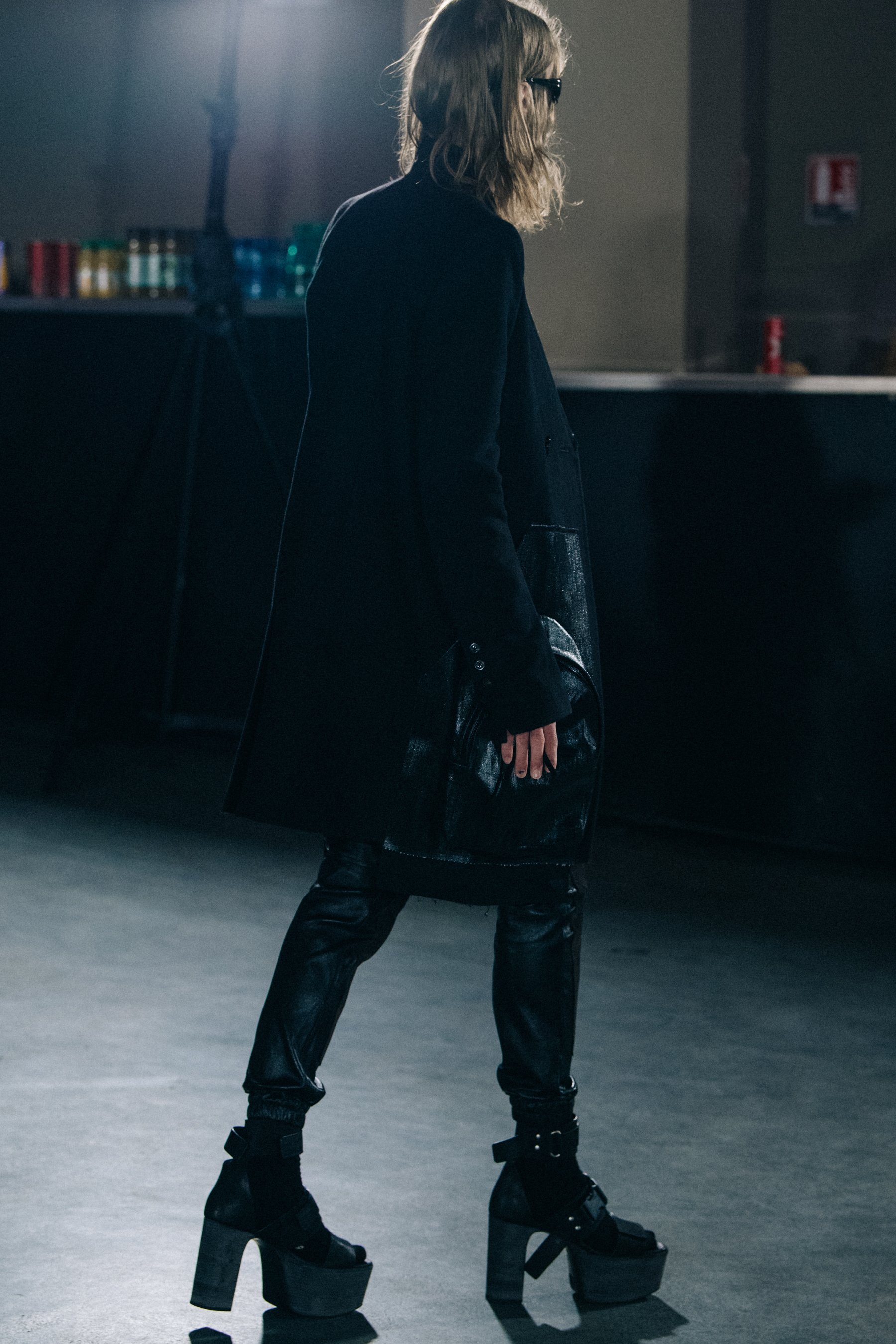 Model wearing black outfit at Rick Owens