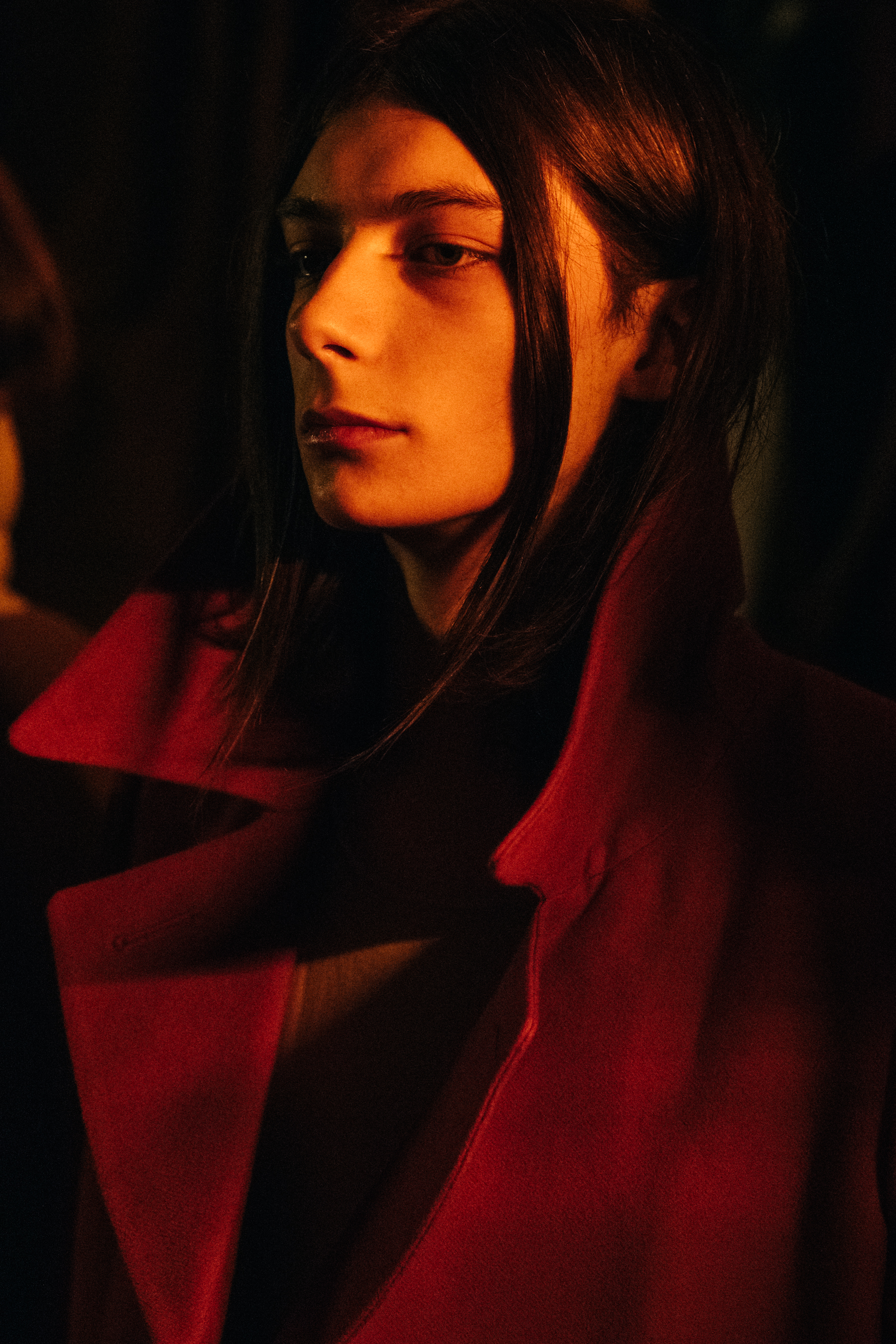 Model wearing red outfit at Rick Owens