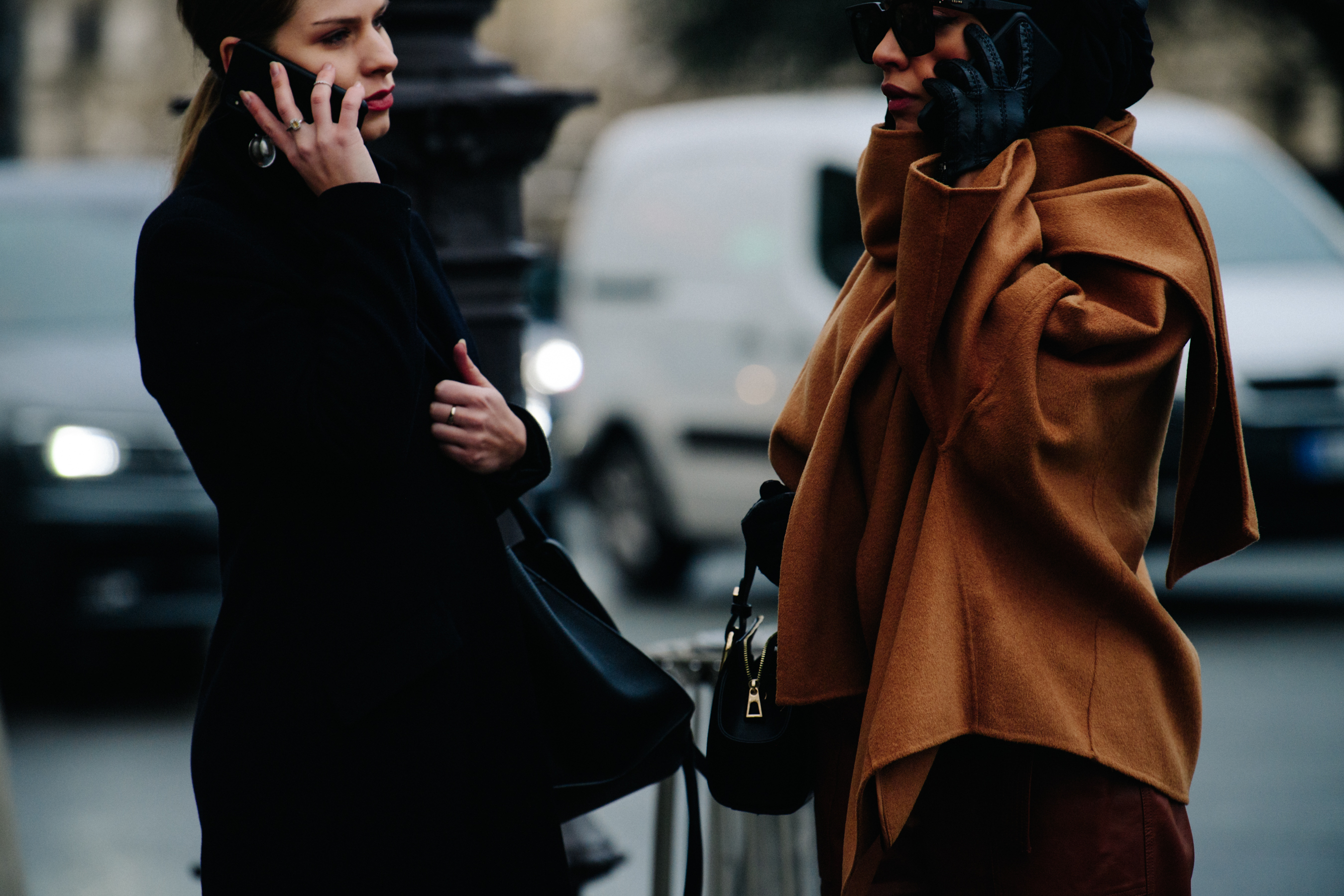 Two women wearing wool coats