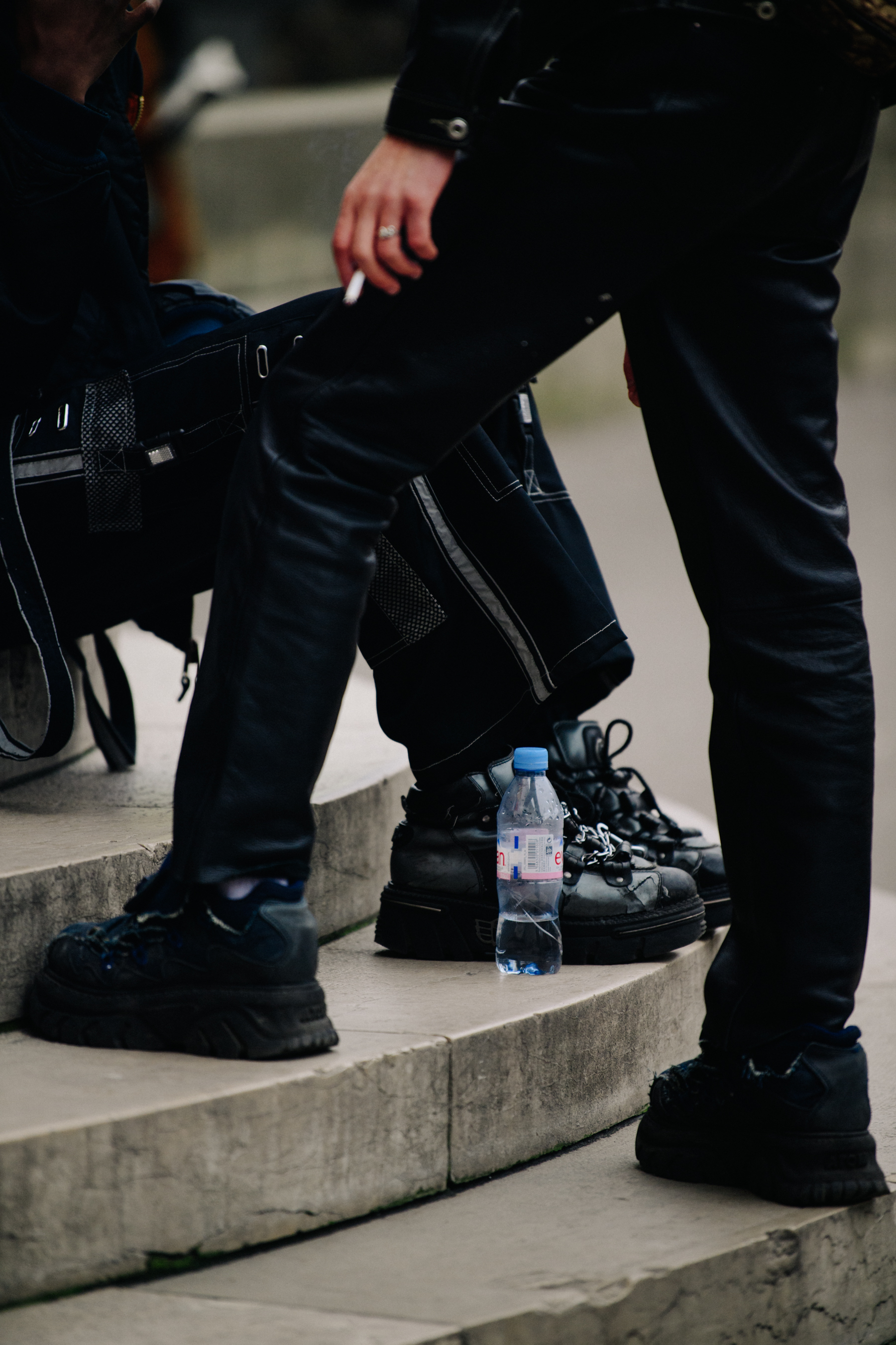 Two people wearing heavy metal boots