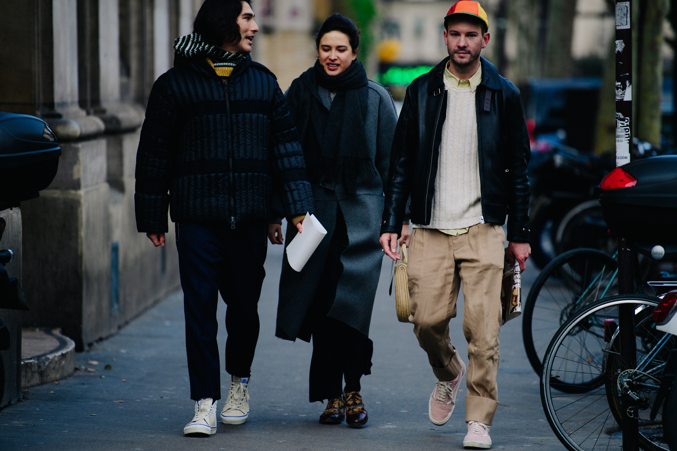Three people dressed stylishly