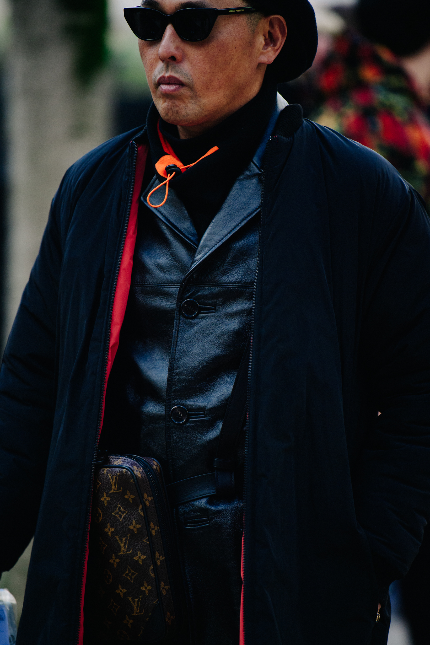 Man wearing leather vest
