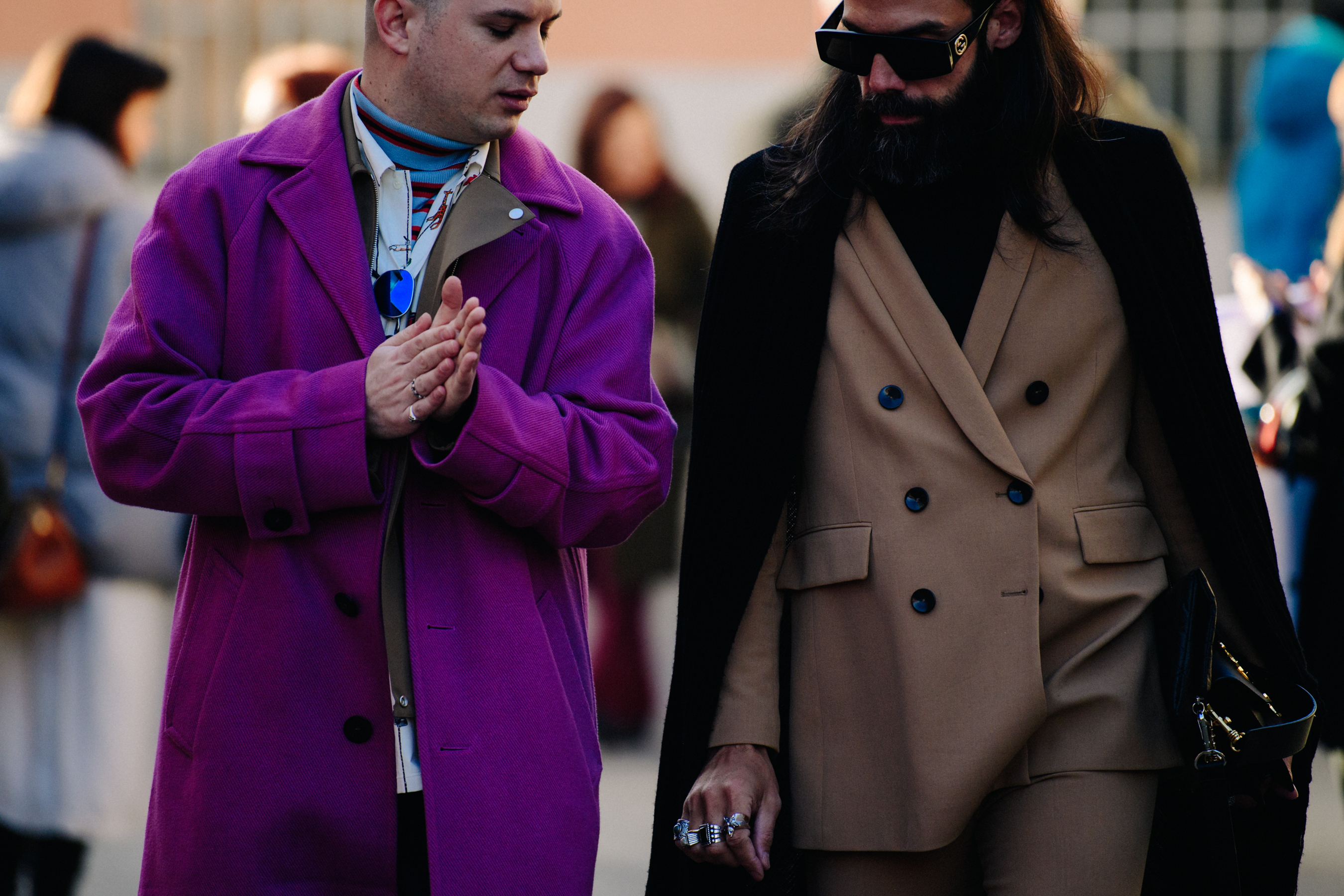Two men wearing winter clothing