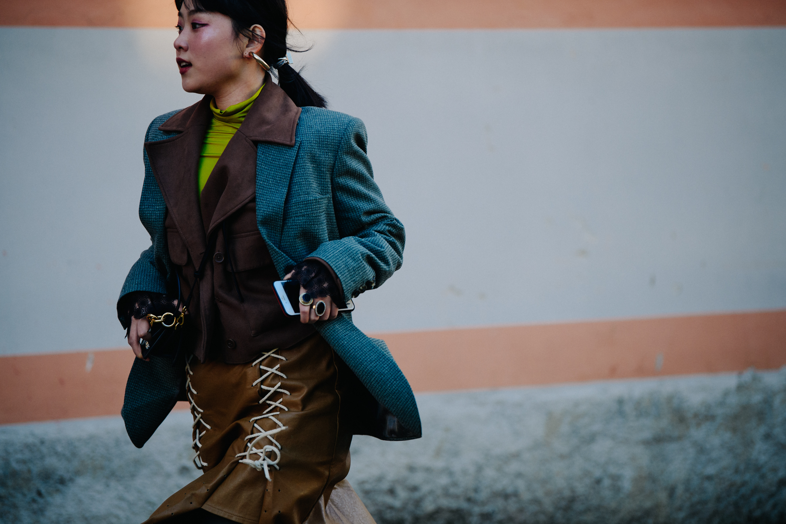Woman wearing JW Anderson skirt