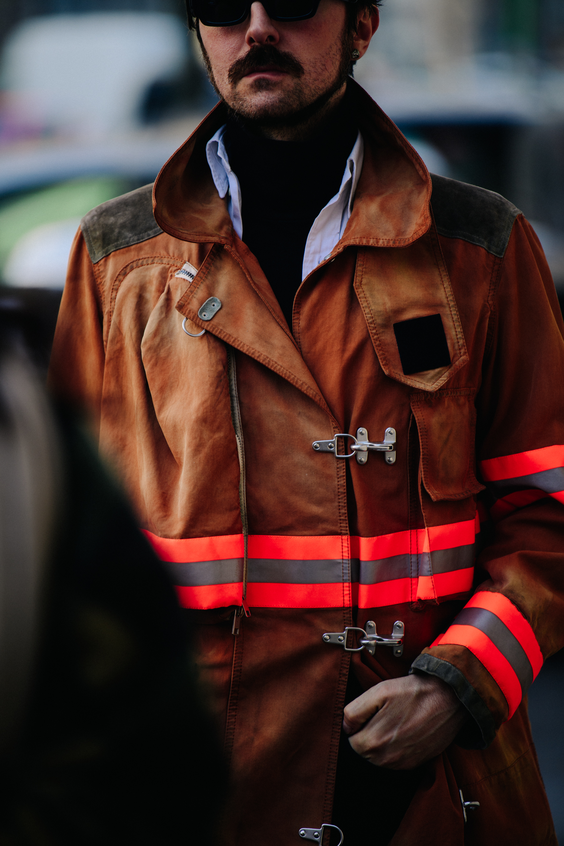 Man wearing firemans coat