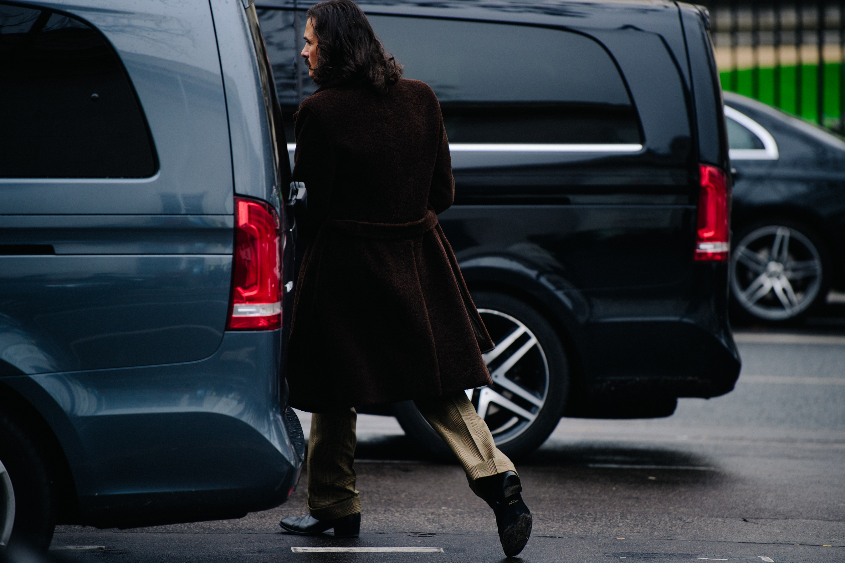 Man wearing brown coat