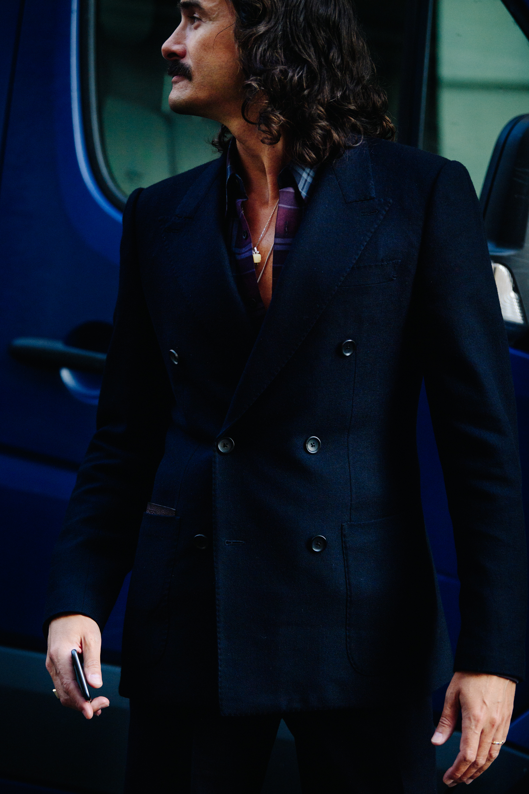 Man wearing breasted jacket
