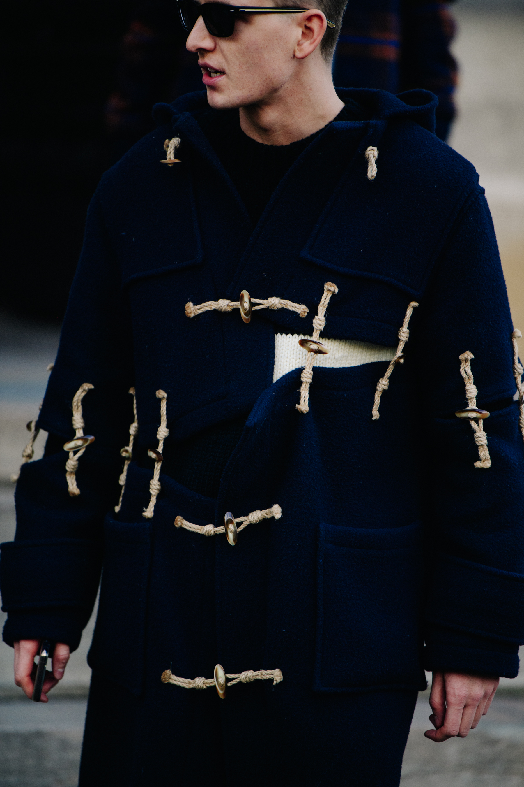 Man wearing JW Anderson coat