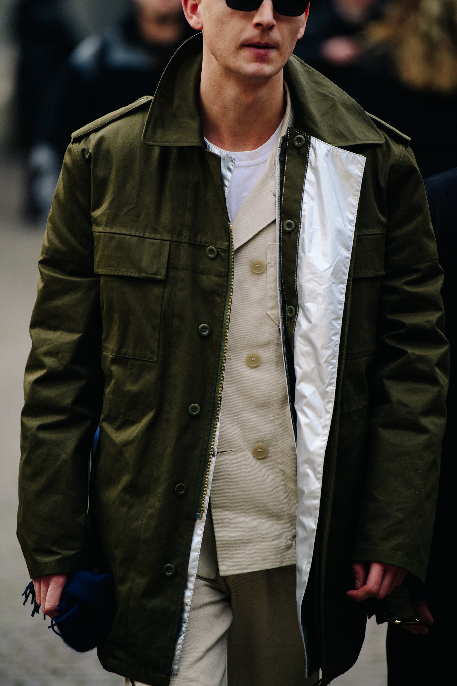 Man wearing green coat