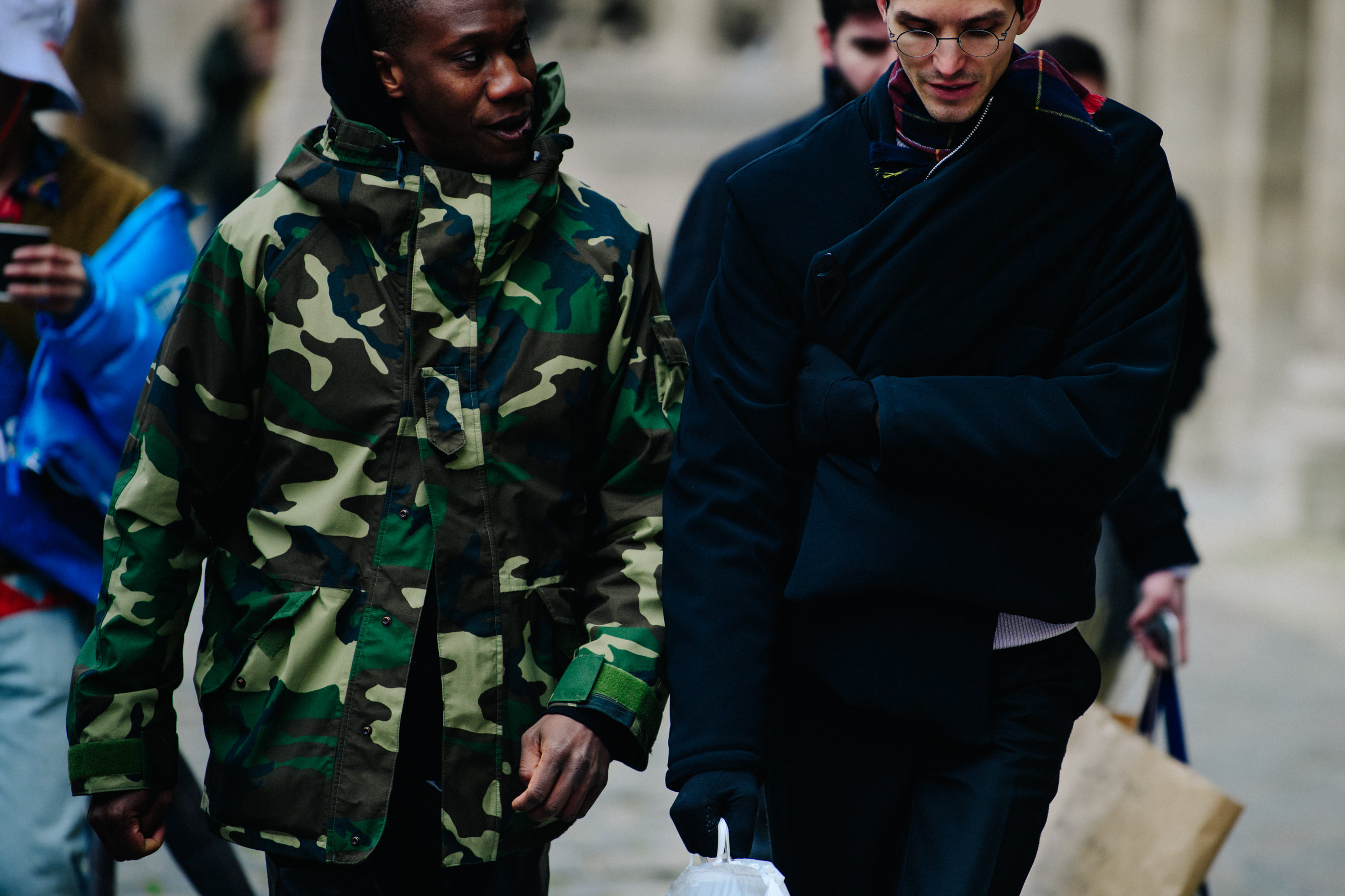 Two men wearing winter jackets