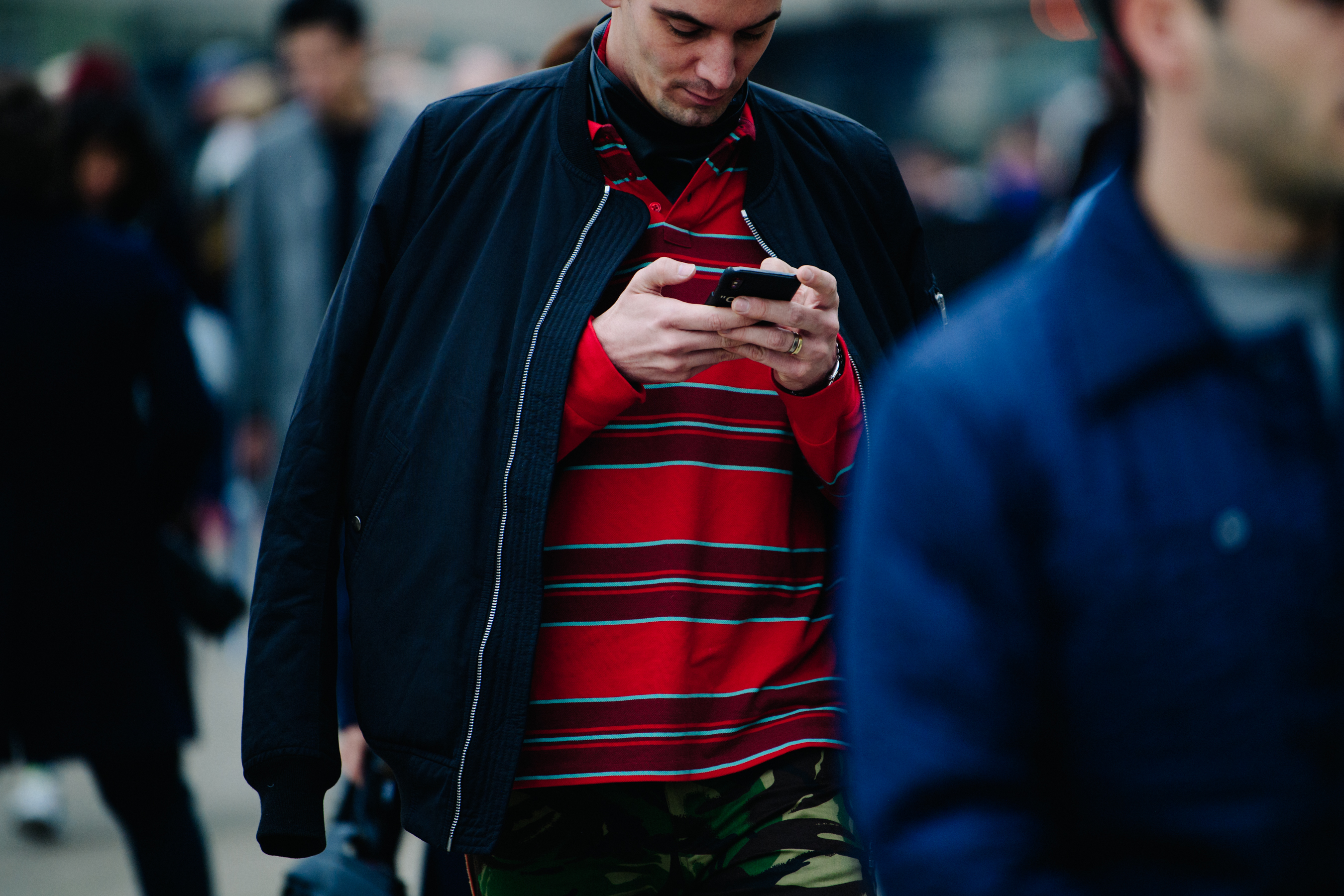 Man wearing striped red shirt