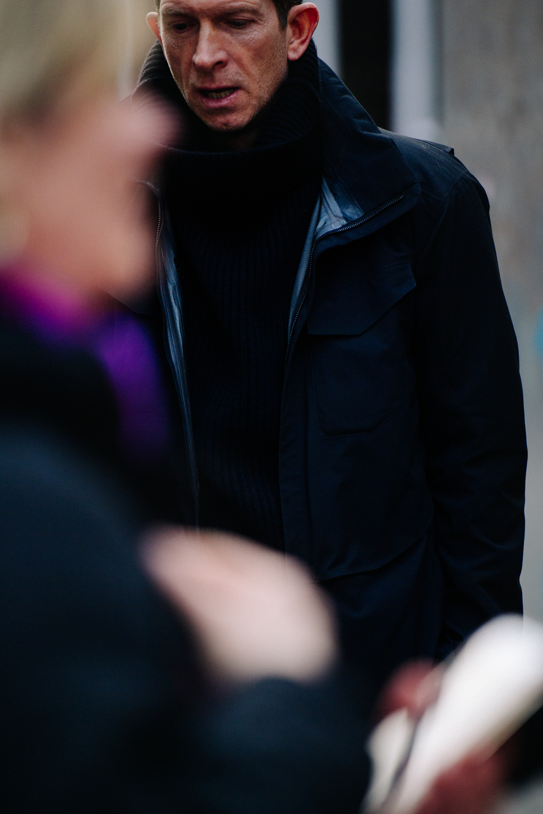 Man wearing Arcteryx Veilance jacket