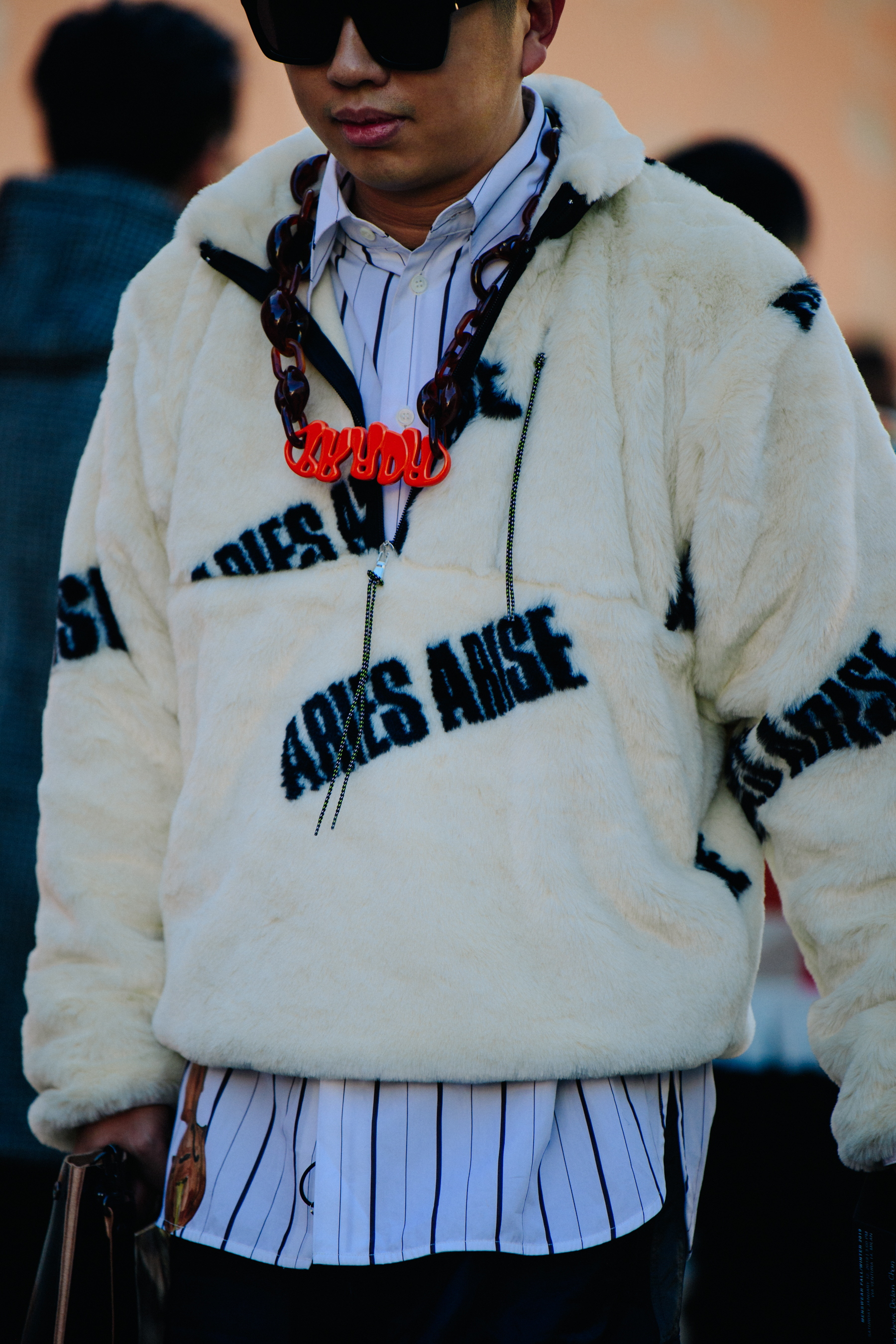 Chinese man wearing Aries Arise