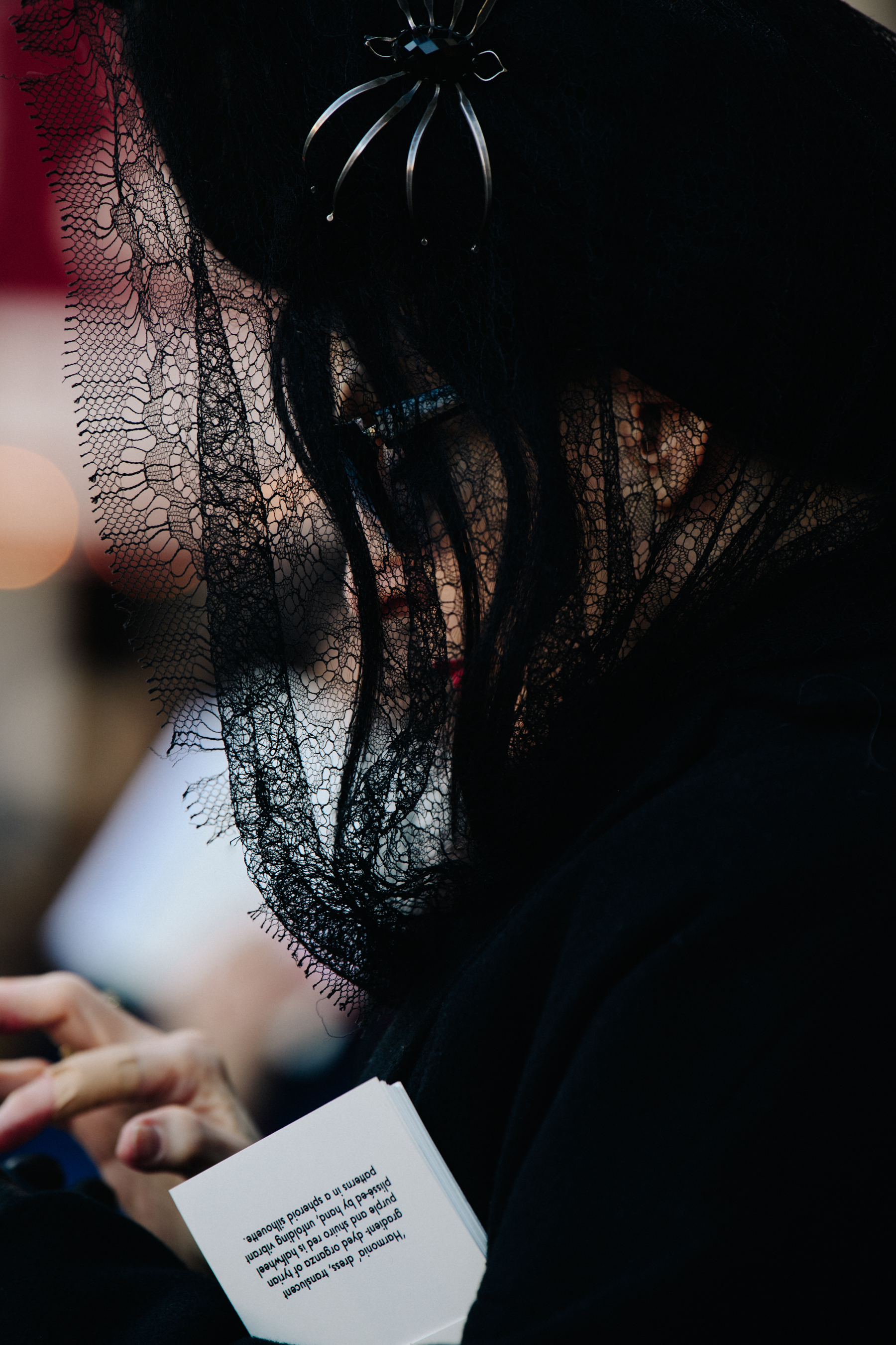 Woman wearing black veil