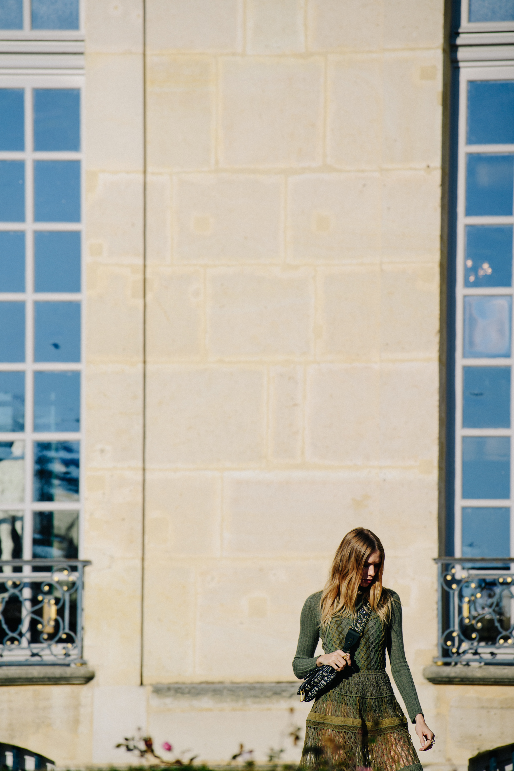 Woman wearing Christian Dior outfit