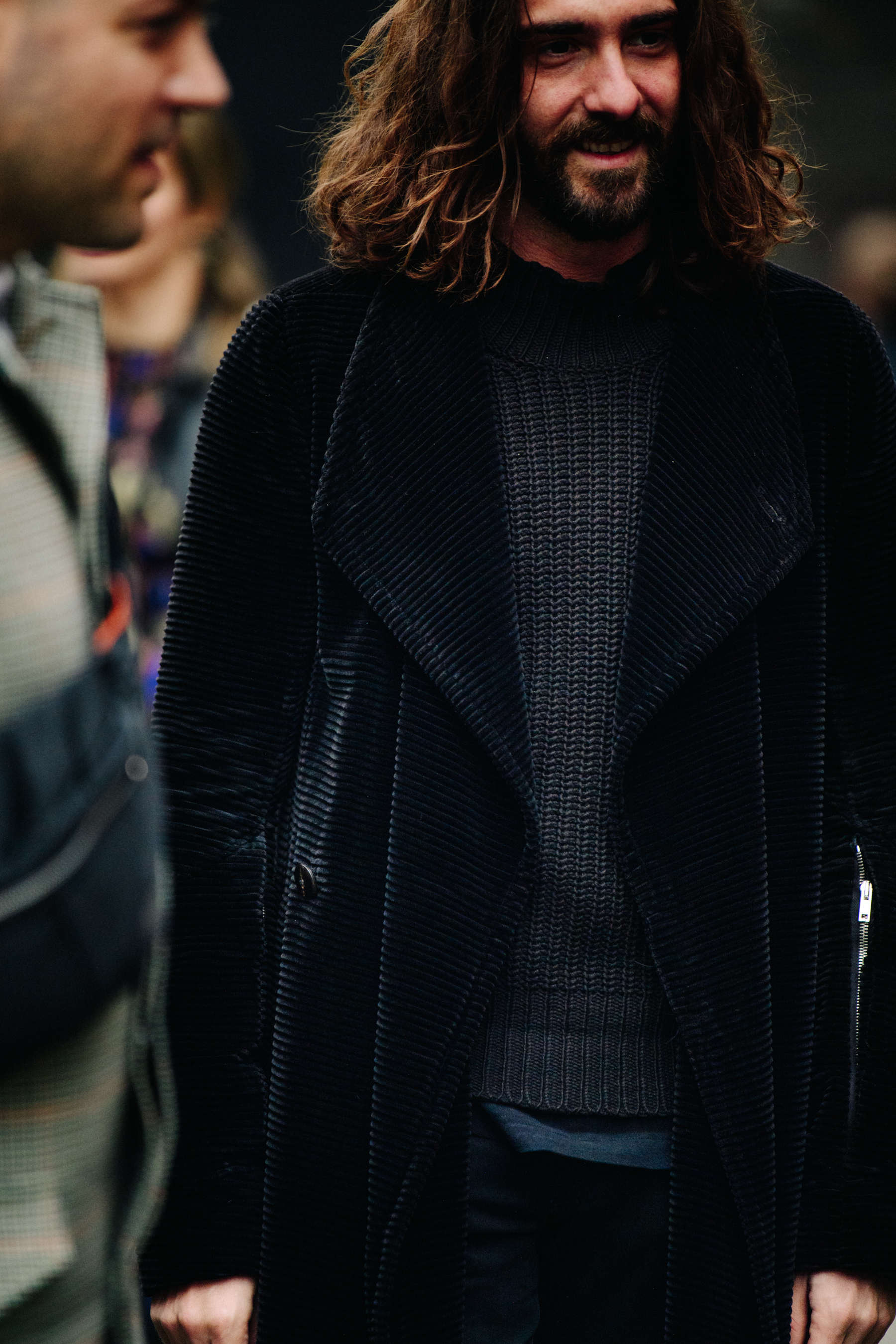 Man wearing black wool outfit