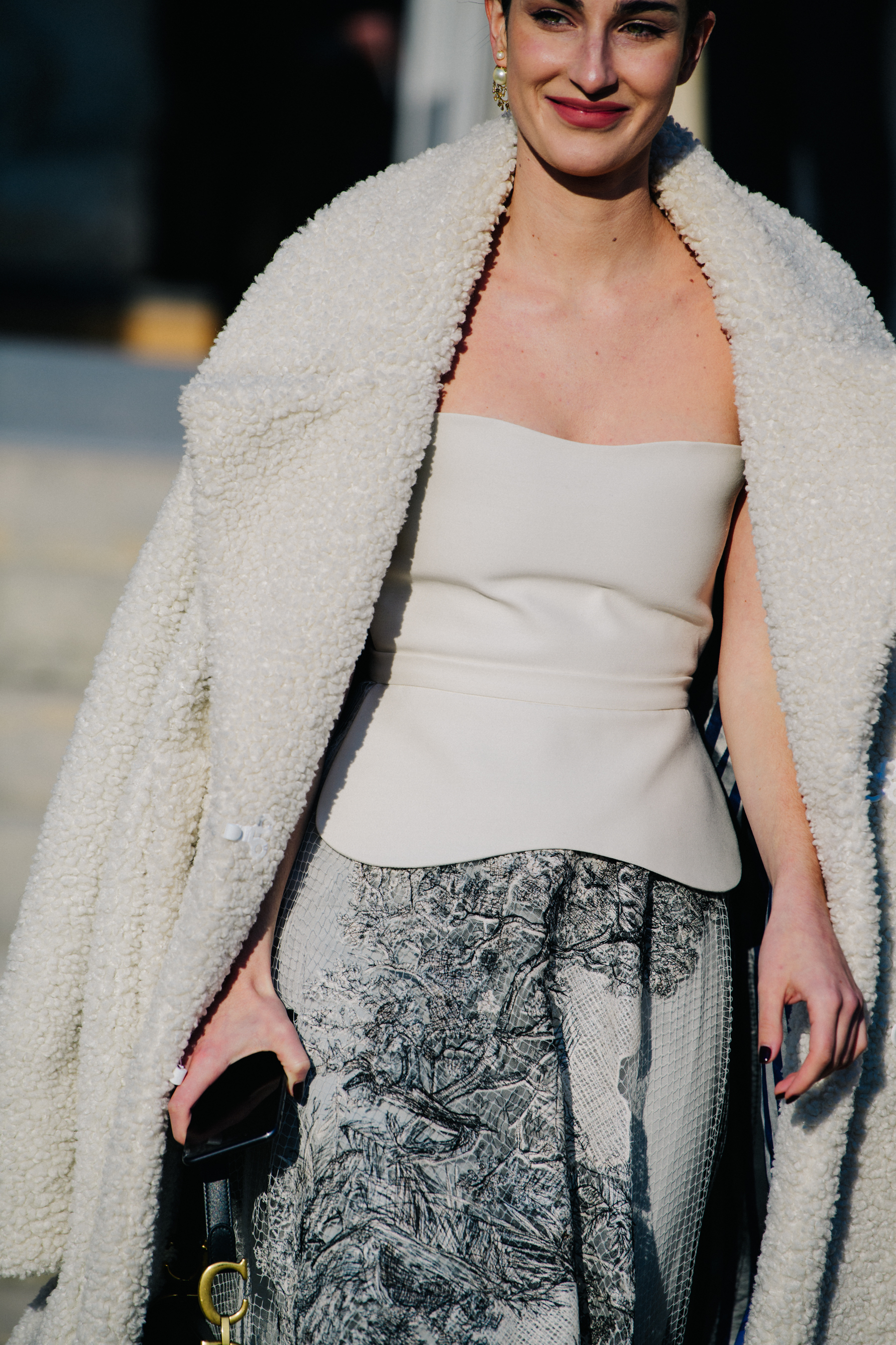 Woman wearing Christian Dior outfit