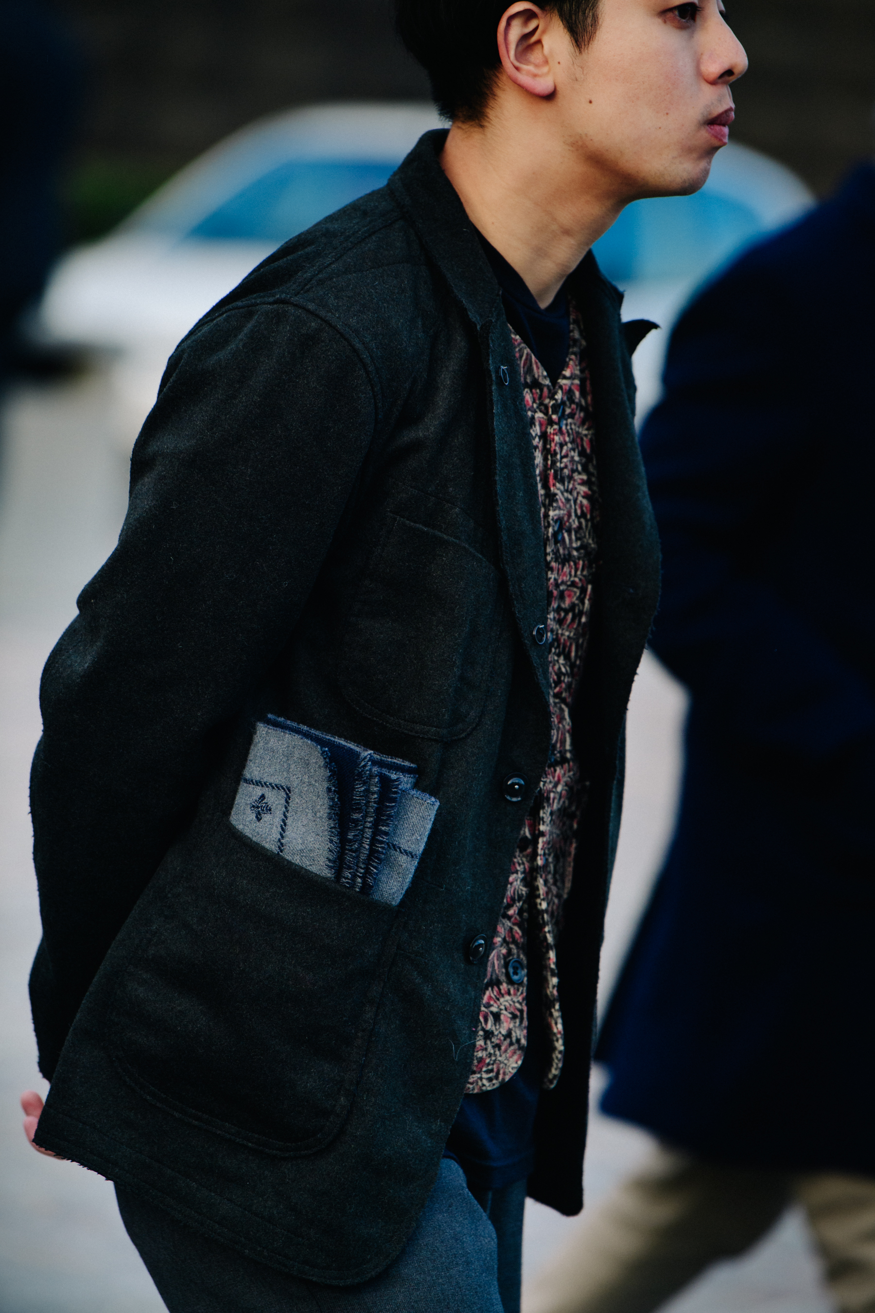 Man wearing grey jacket