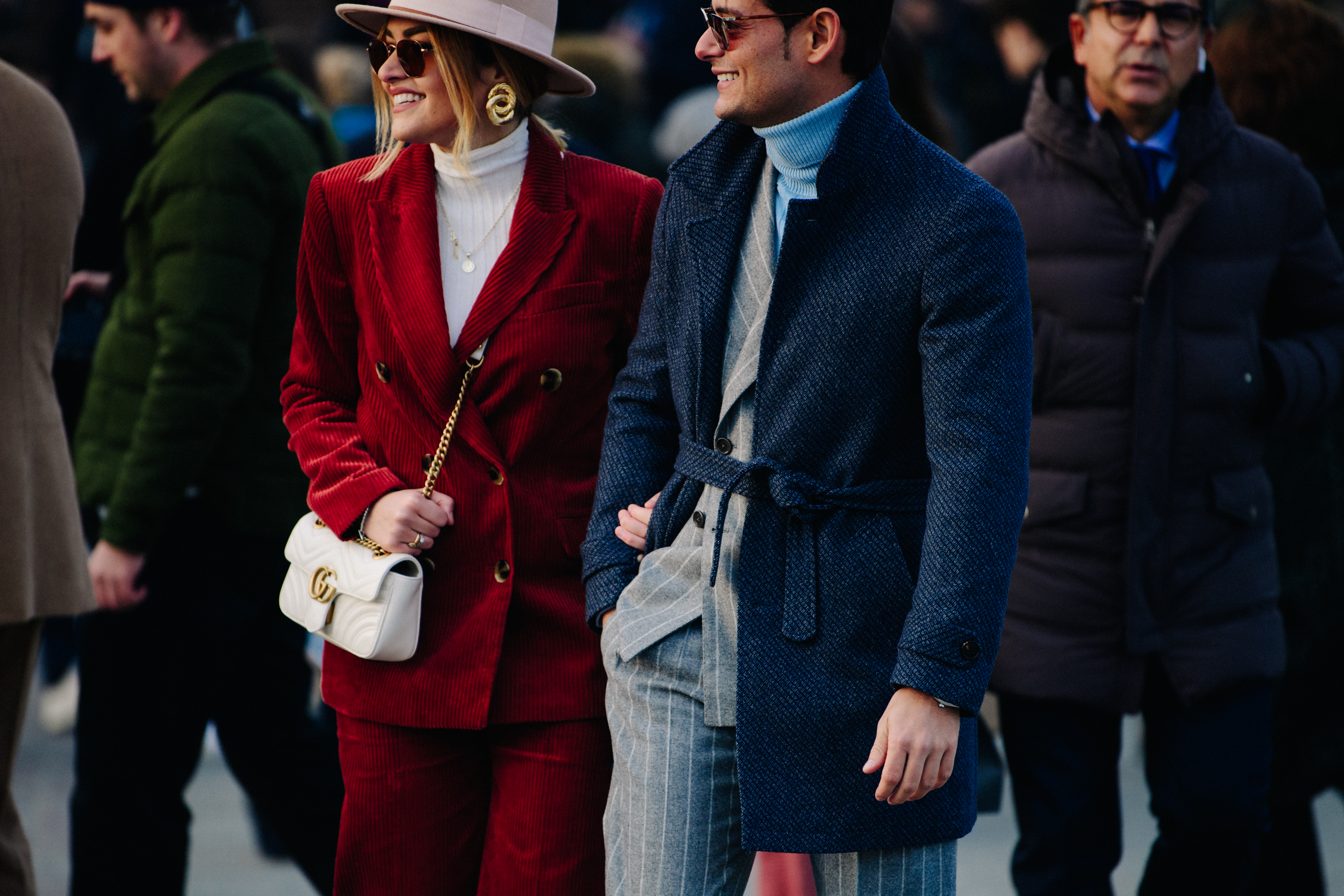 Couple wearing blue and red