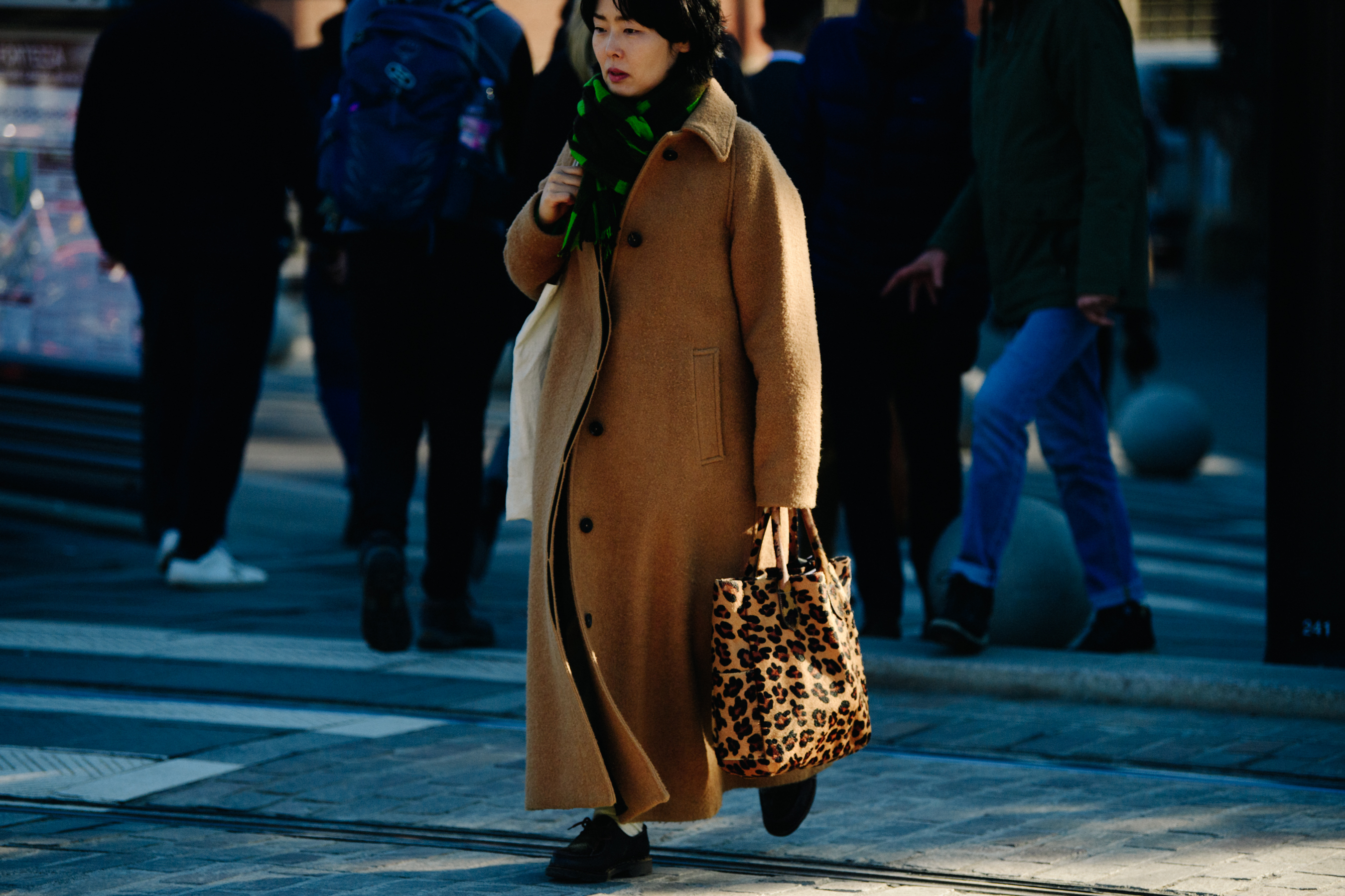 Woman wearing brown wool coat