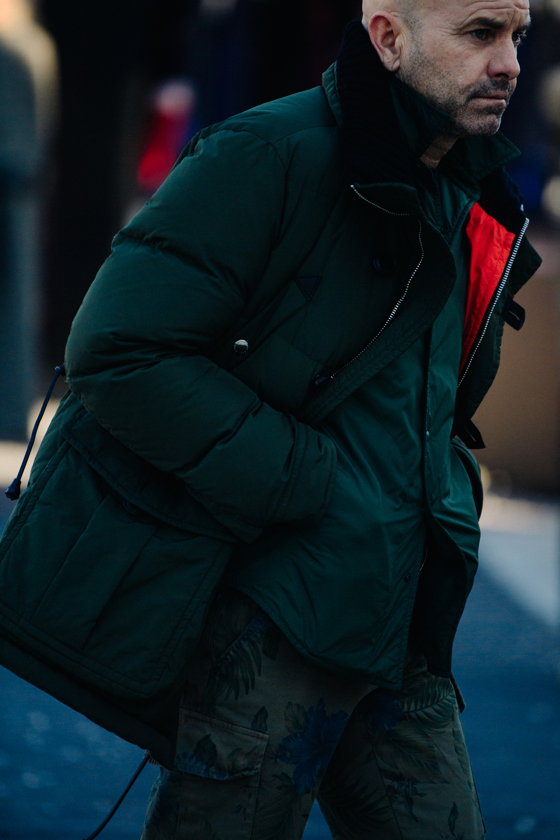 Man wearing green winter coat