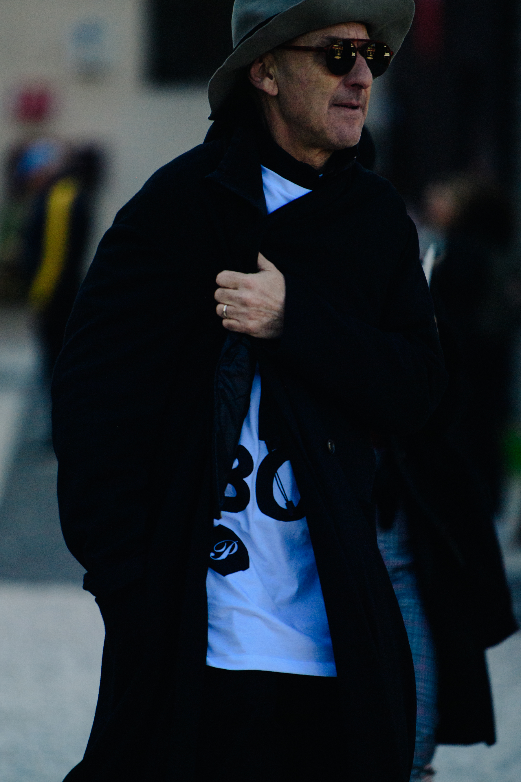 Man wearing dark outfit