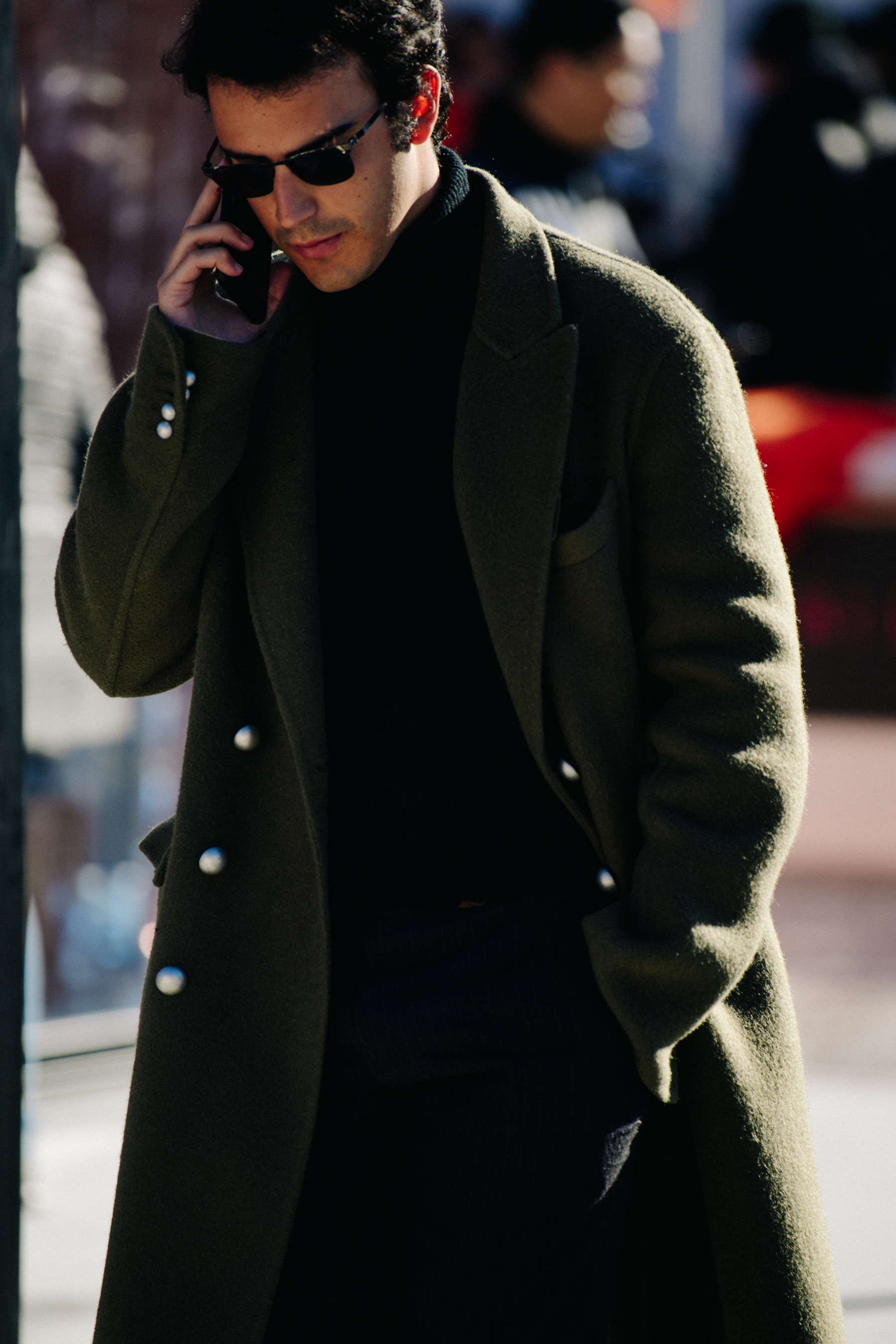 Man wearing green coat