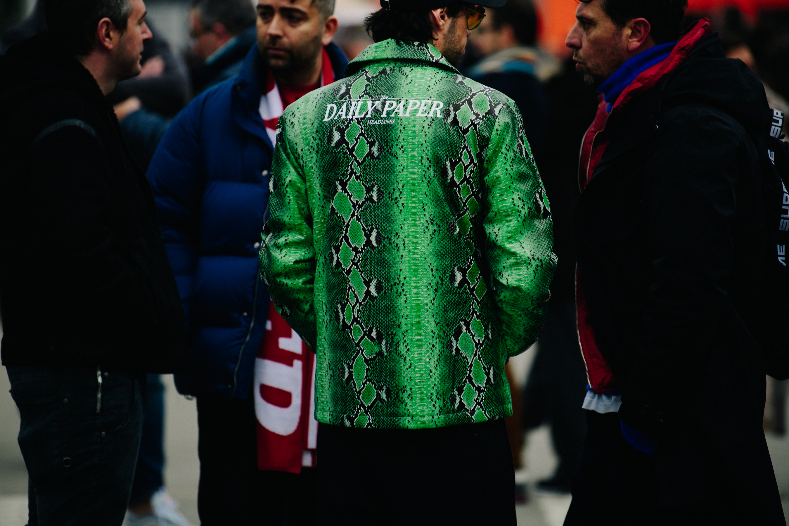 Man wearing green snakeskin jacket