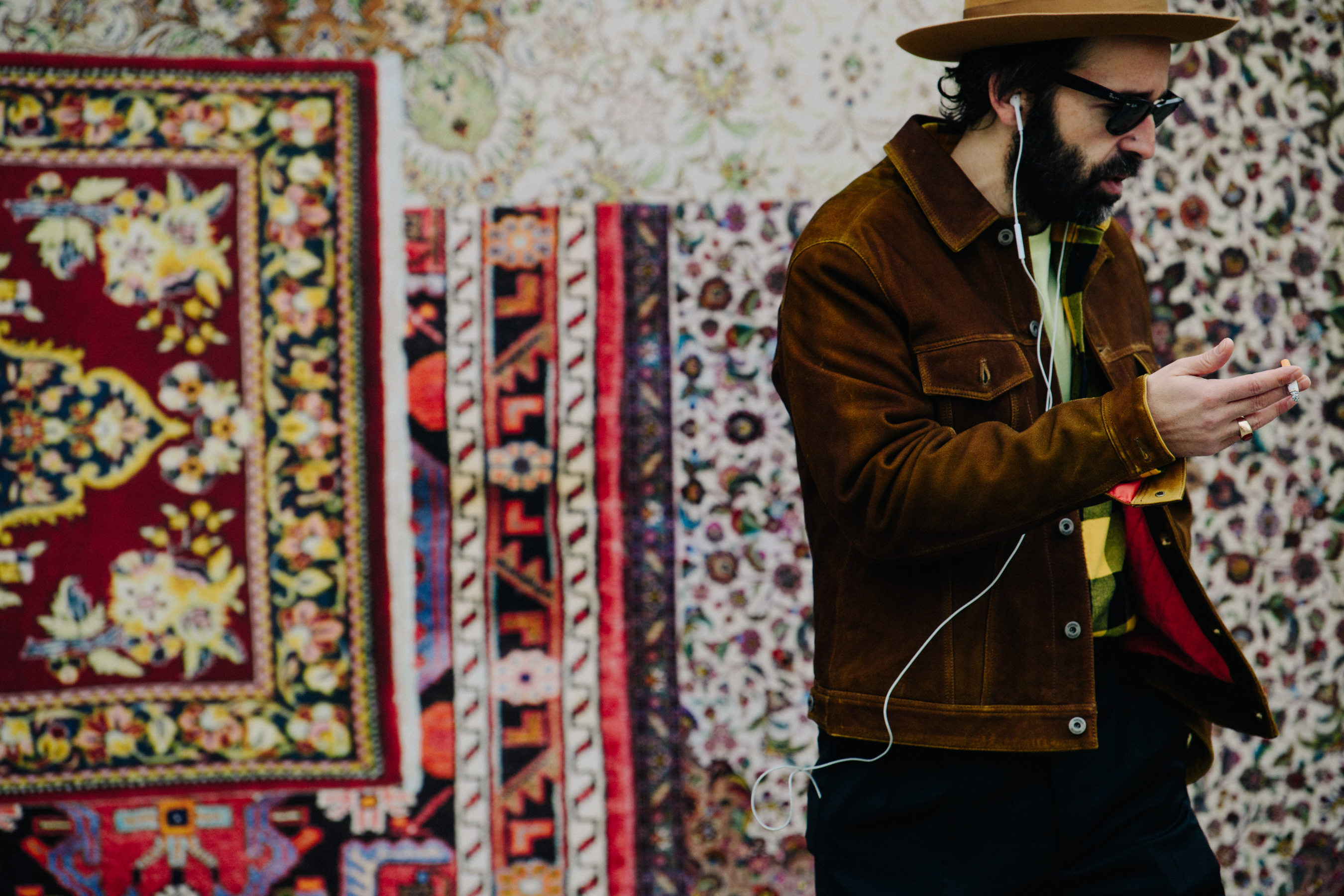 Man wearing brown suede jacket
