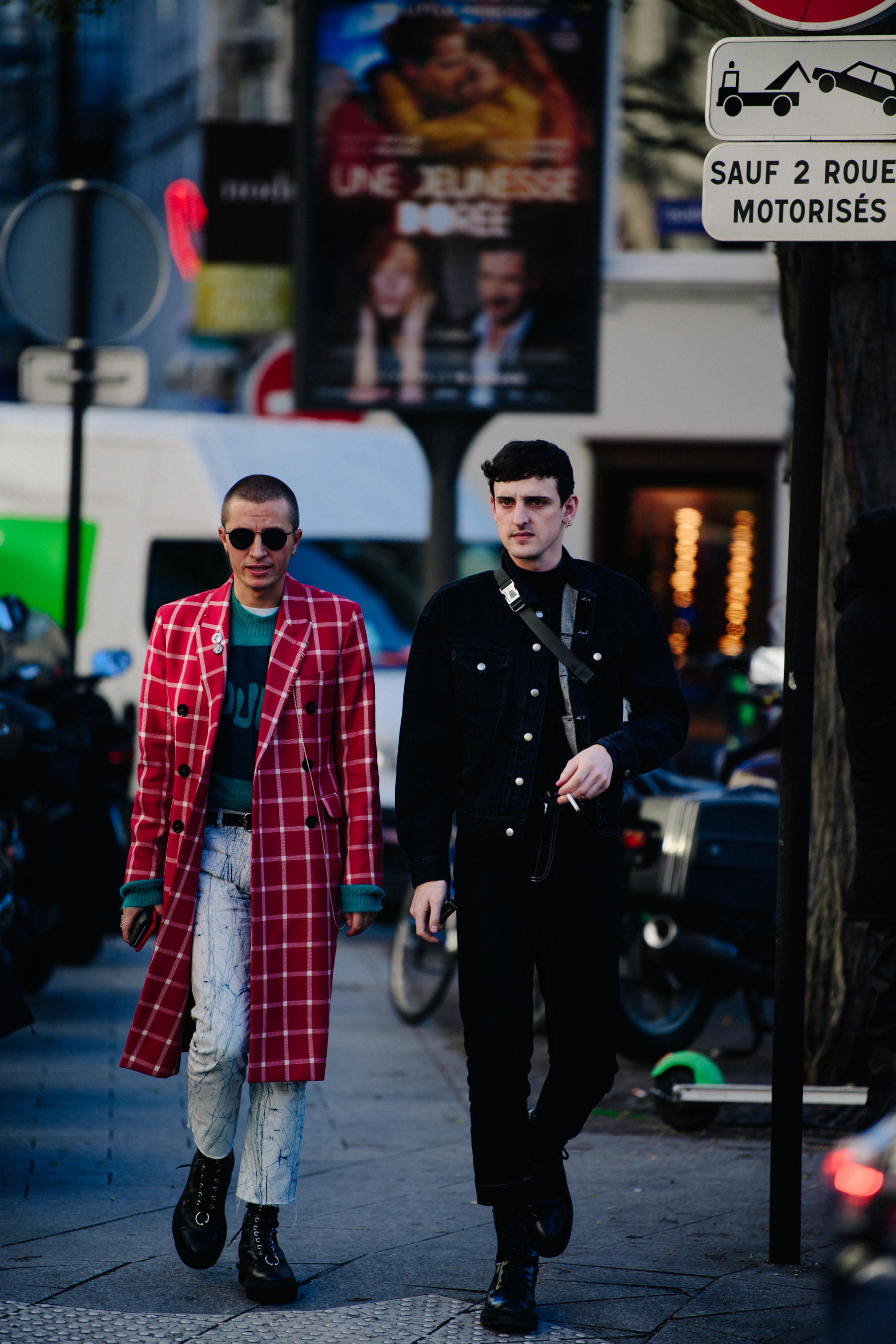 Two men wearing long outfits