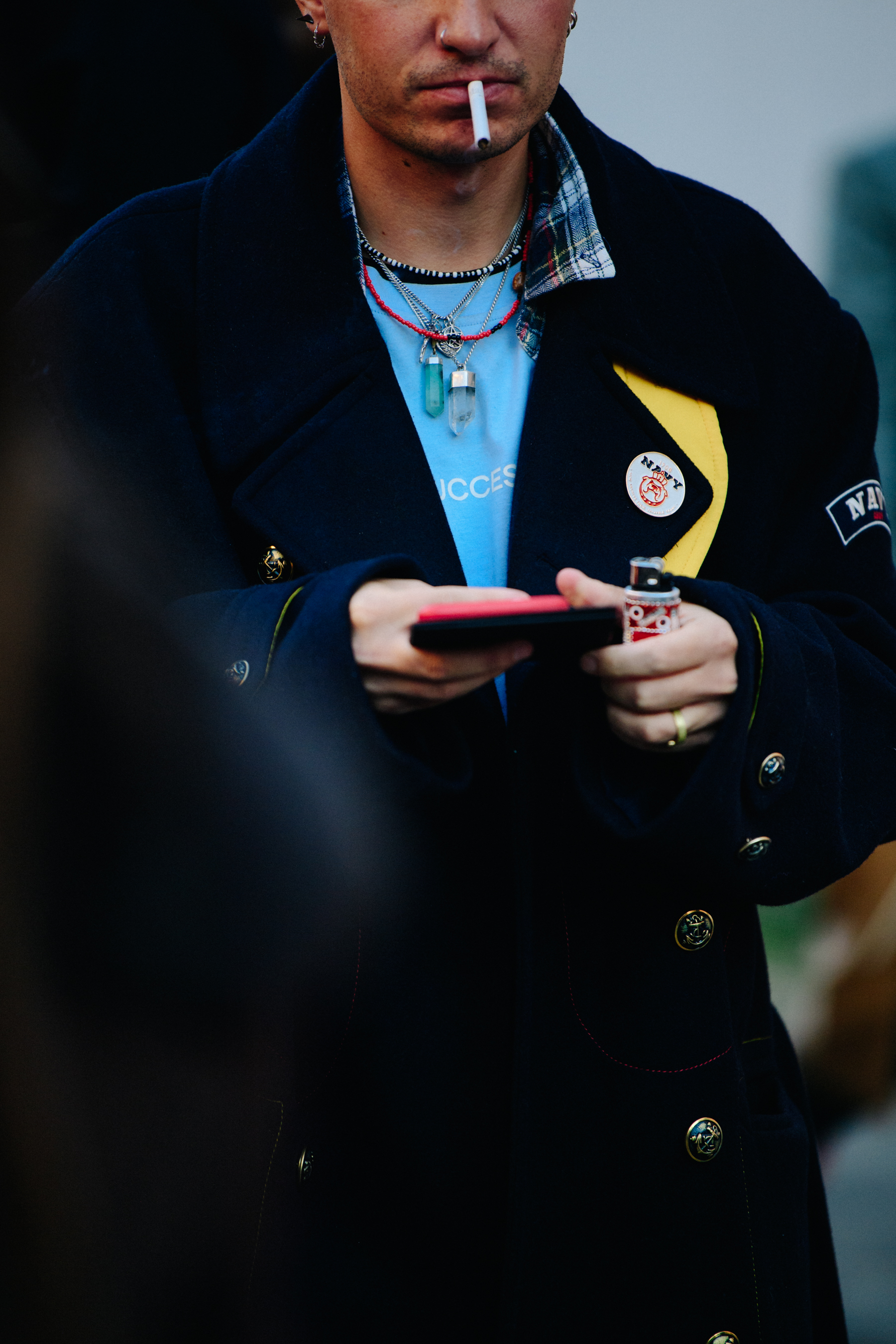 Man wearing blue coat