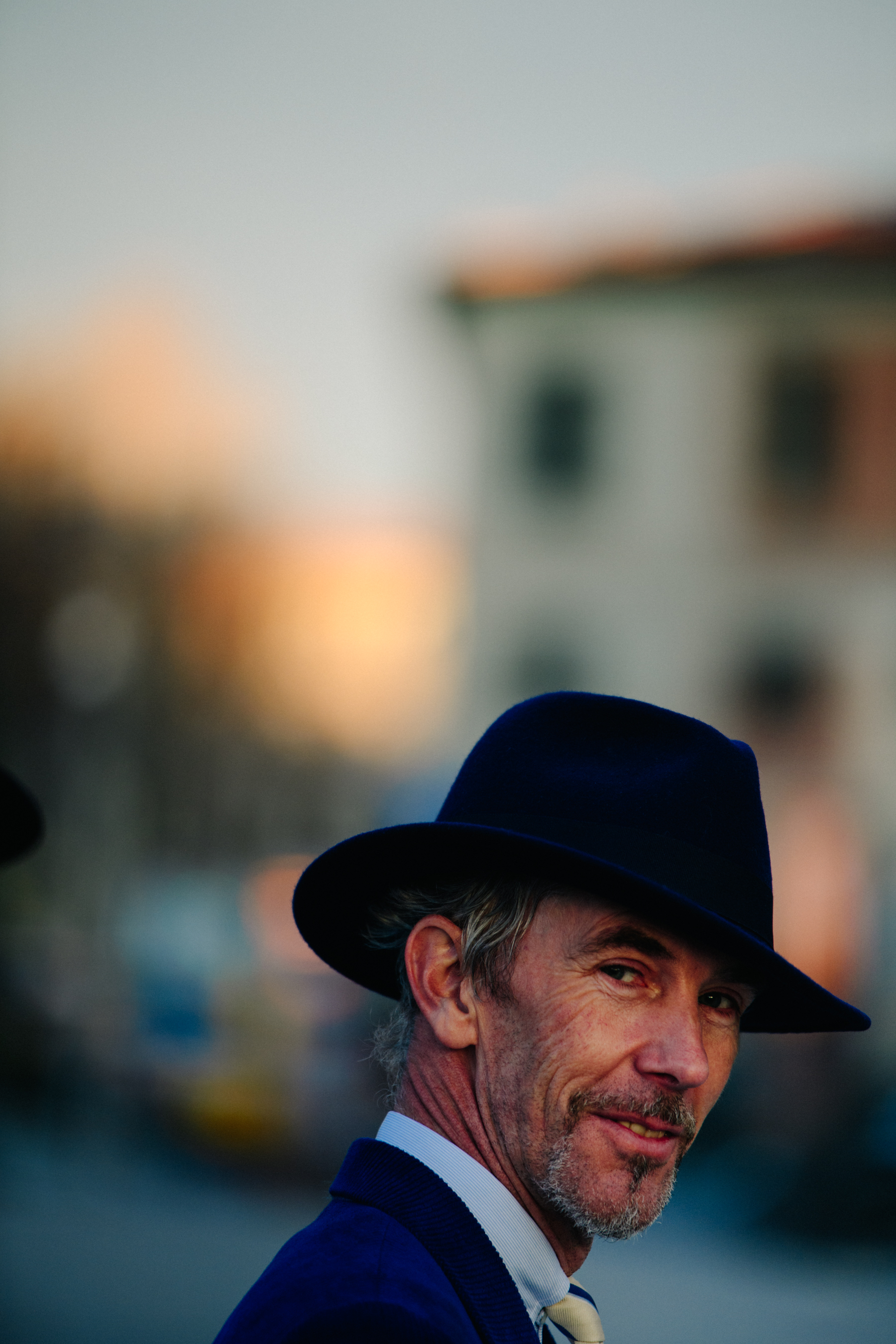 Man wearing dark hat