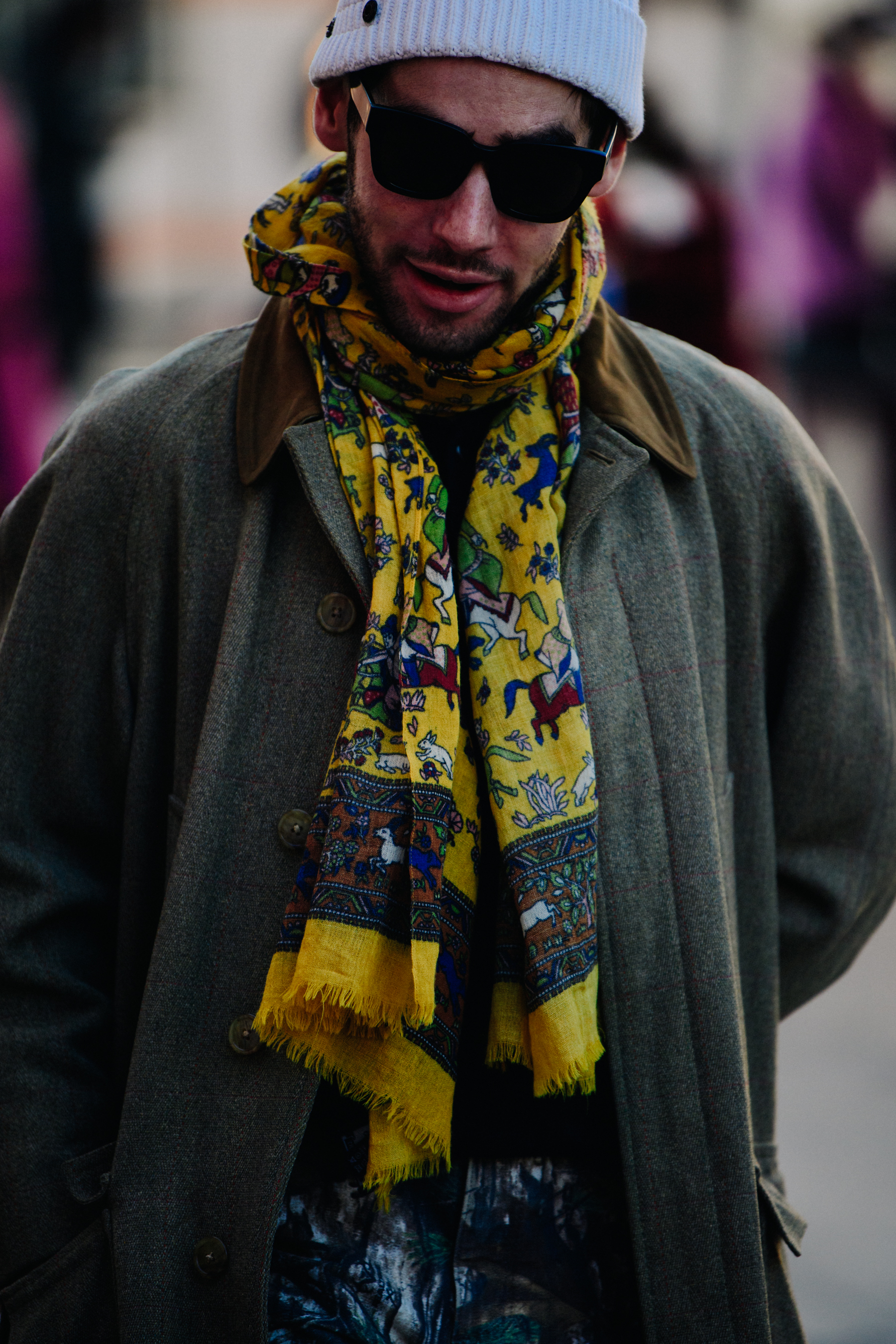 Man wearing yellow scarf