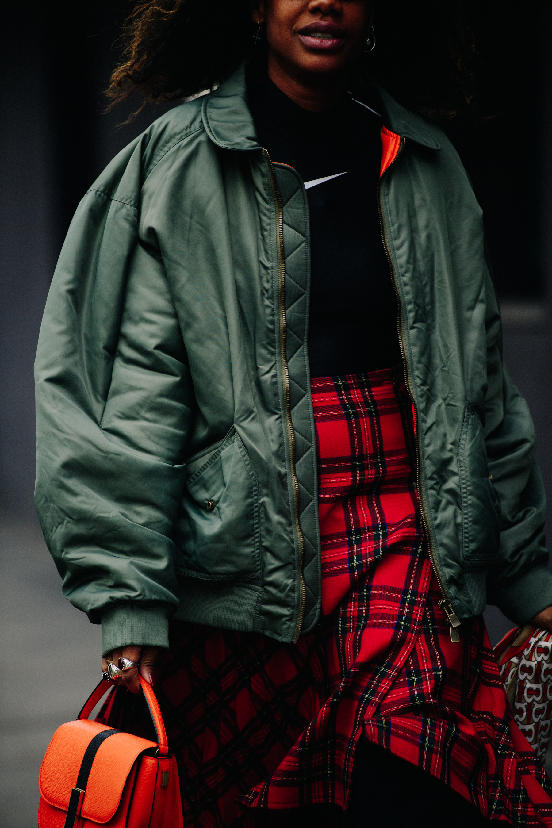Woman wearing bomber jacket