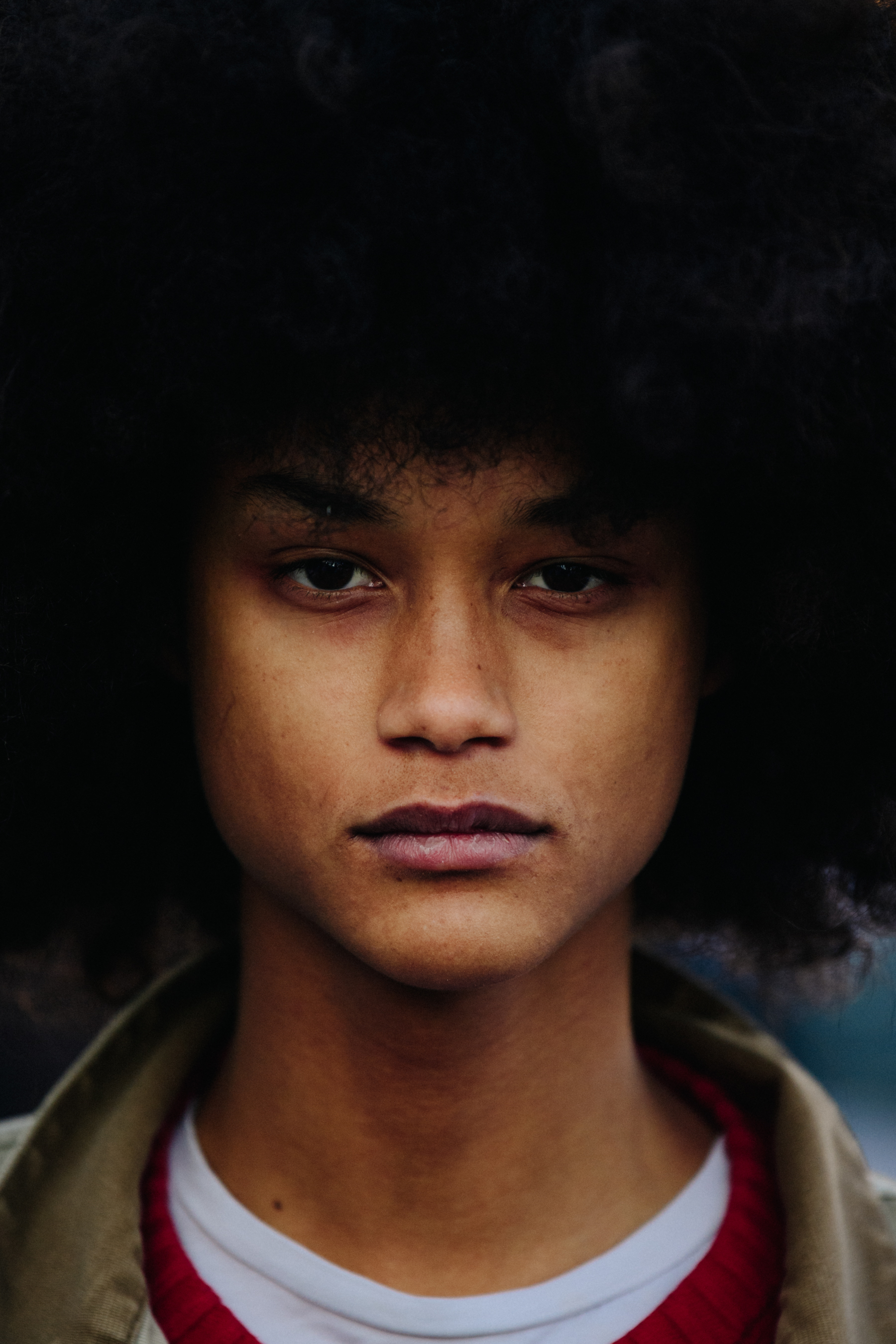 Portrait of model with giant afro