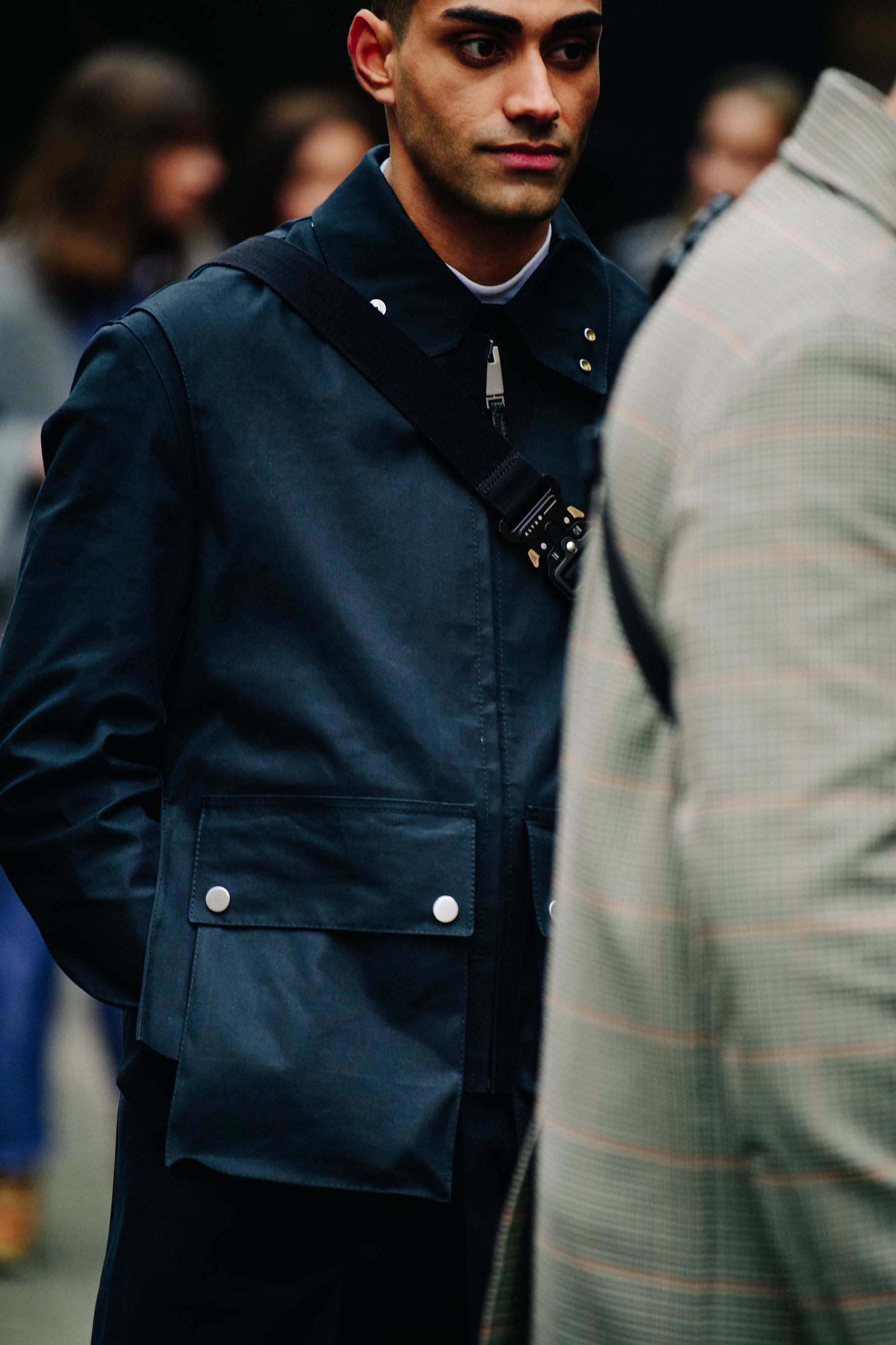 Man wearing Alyx bag