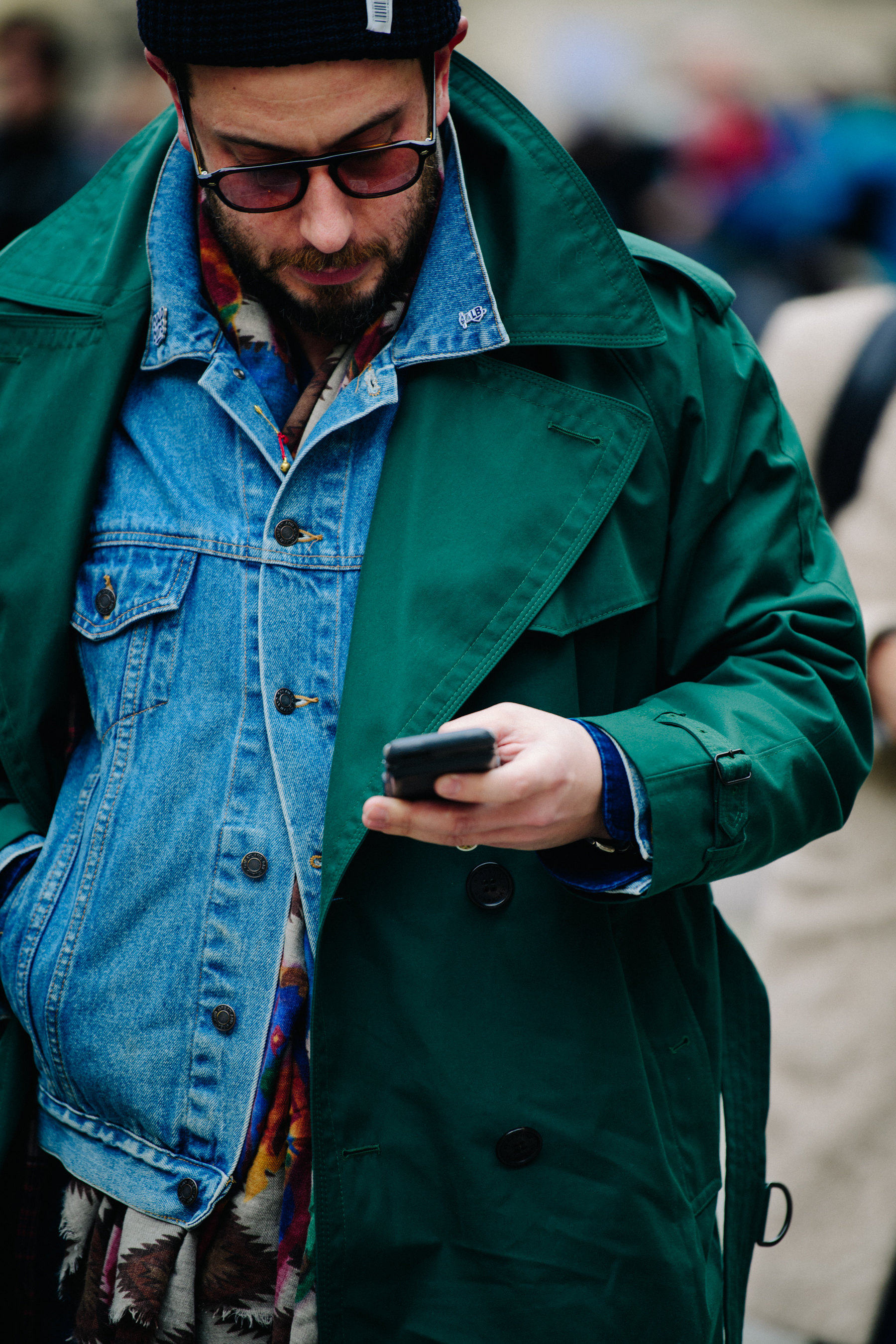 Man wearing green coat