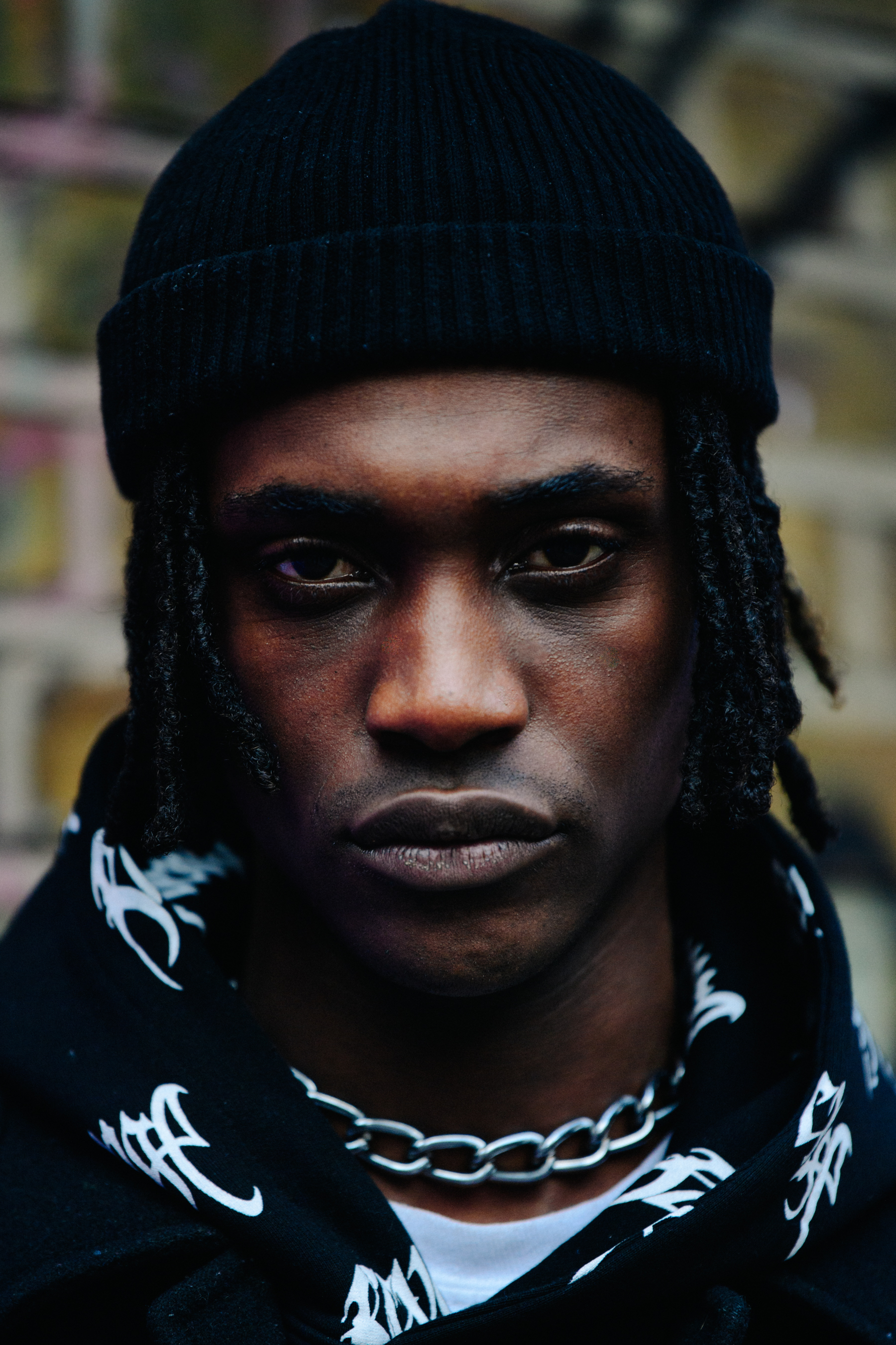 Portrait of man wearing silver chain